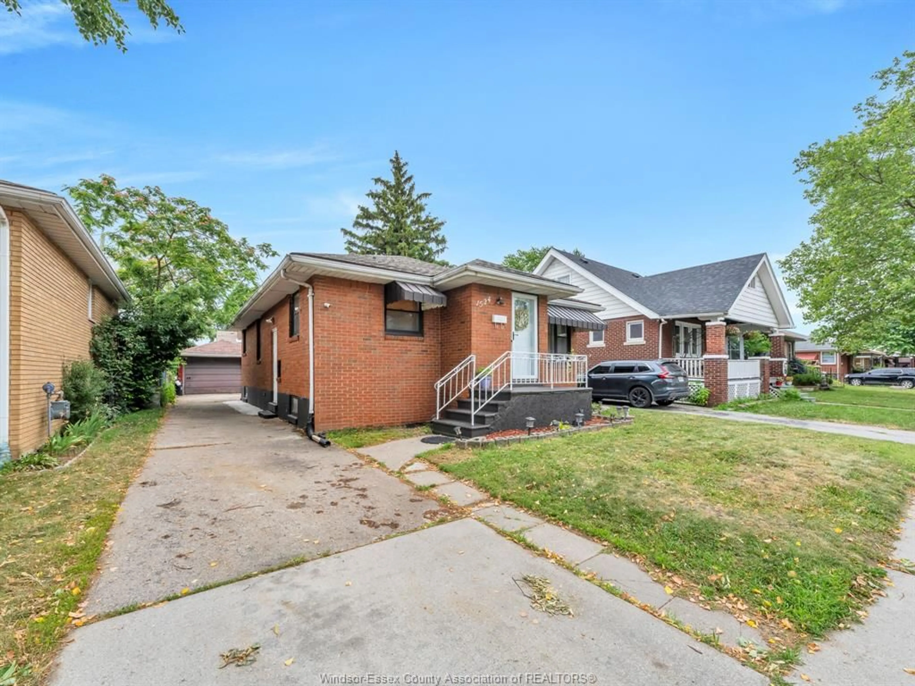 Home with brick exterior material, street for 1524 PILLETTE Rd, Windsor Ontario N8Y 3C2