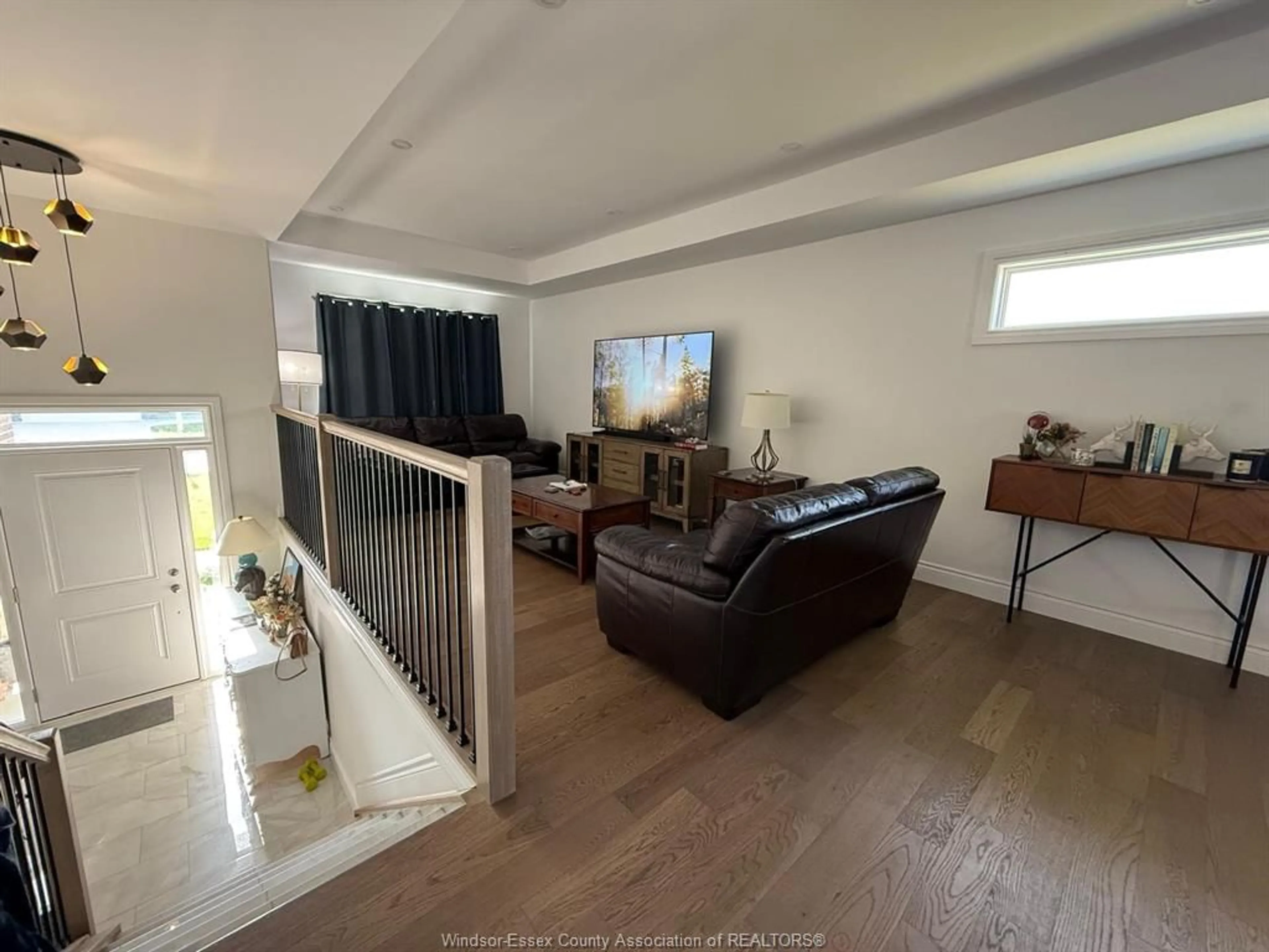 Living room with furniture, wood/laminate floor for 510 HARRIS, Amherstburg Ontario N9V 0A9