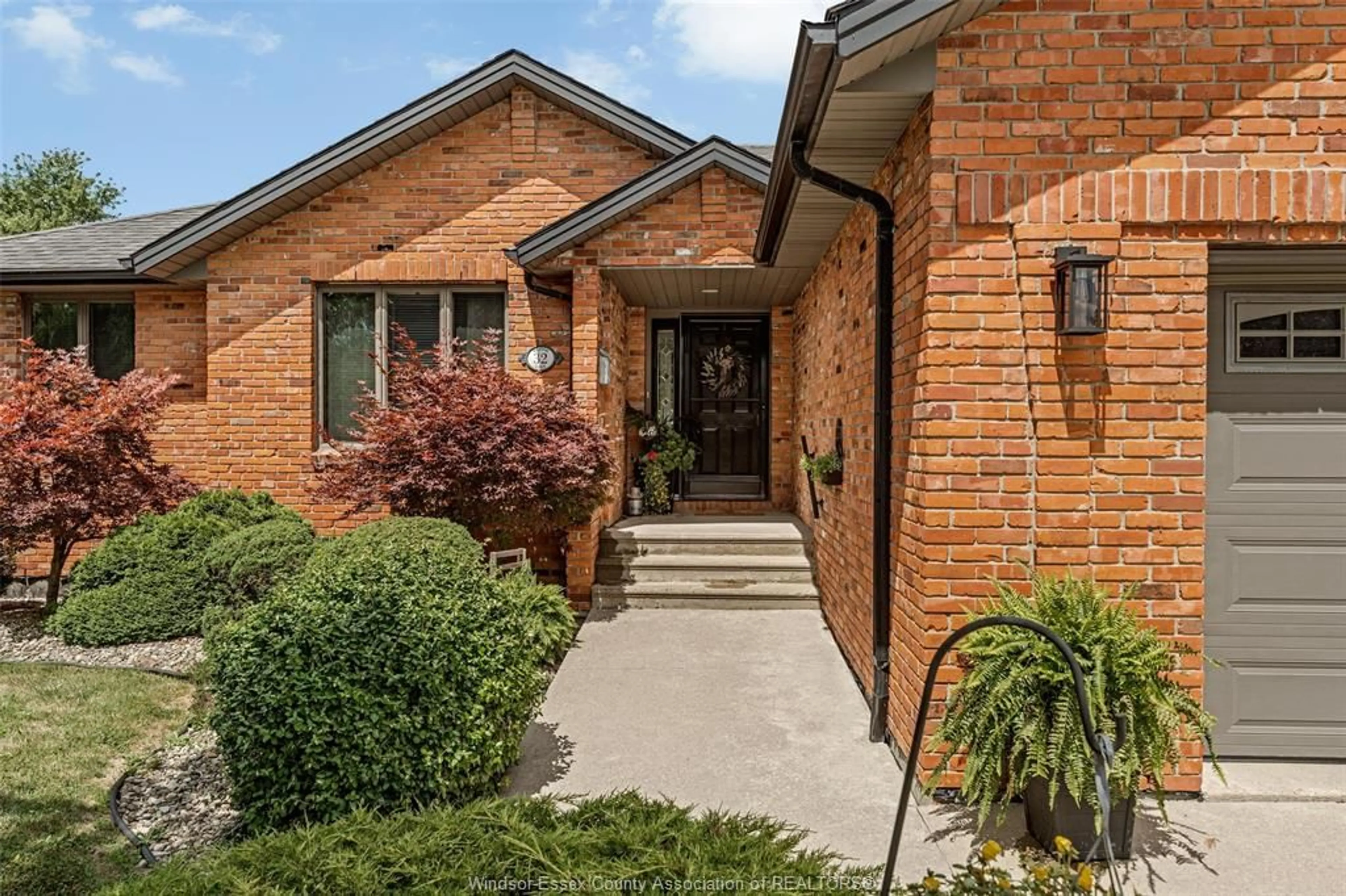 Home with brick exterior material, street for 32 MEADOW LANE, Essex Ontario N8M 3C5