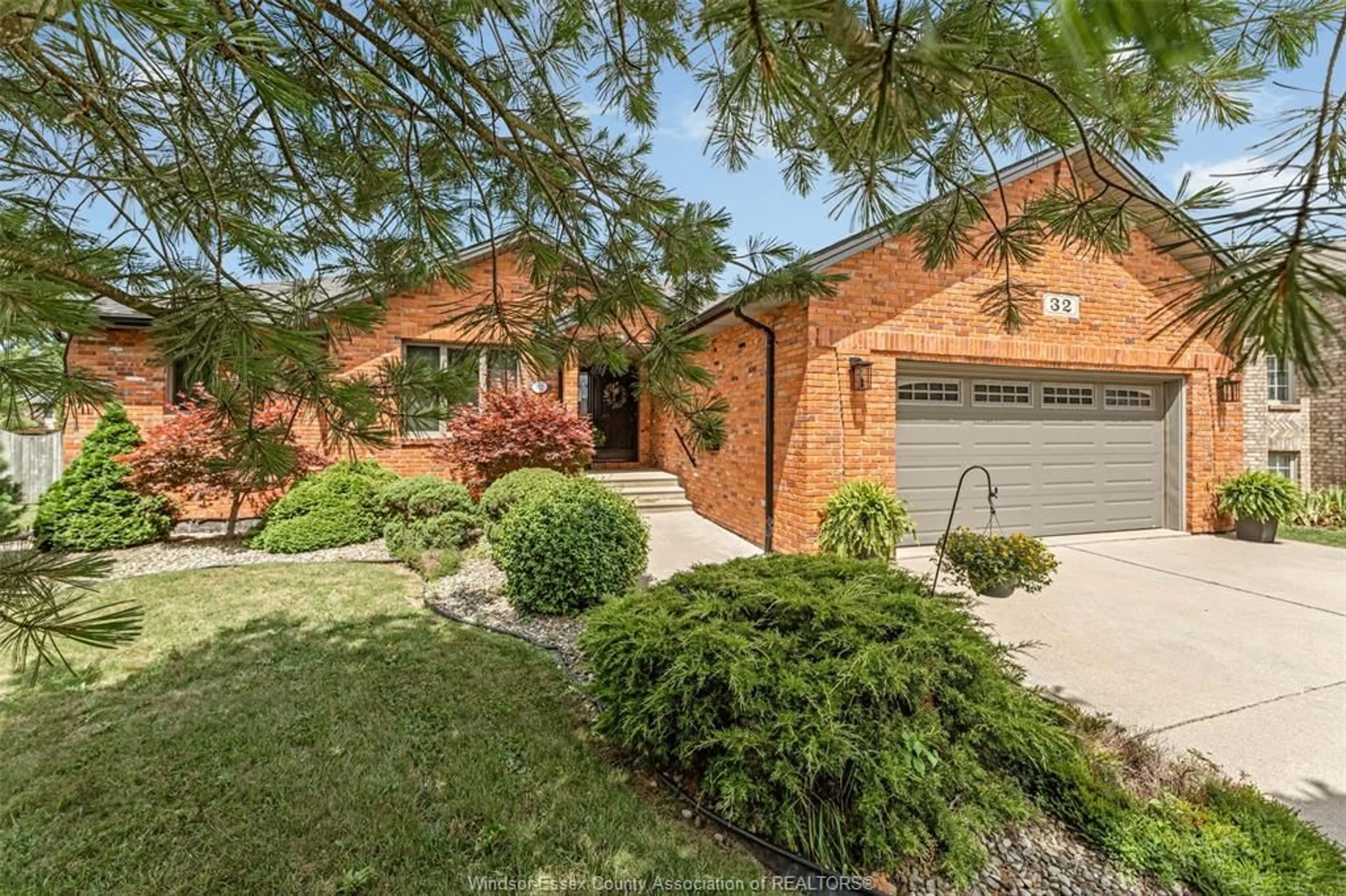 Home with brick exterior material, street for 32 MEADOW LANE, Essex Ontario N8M 3C5