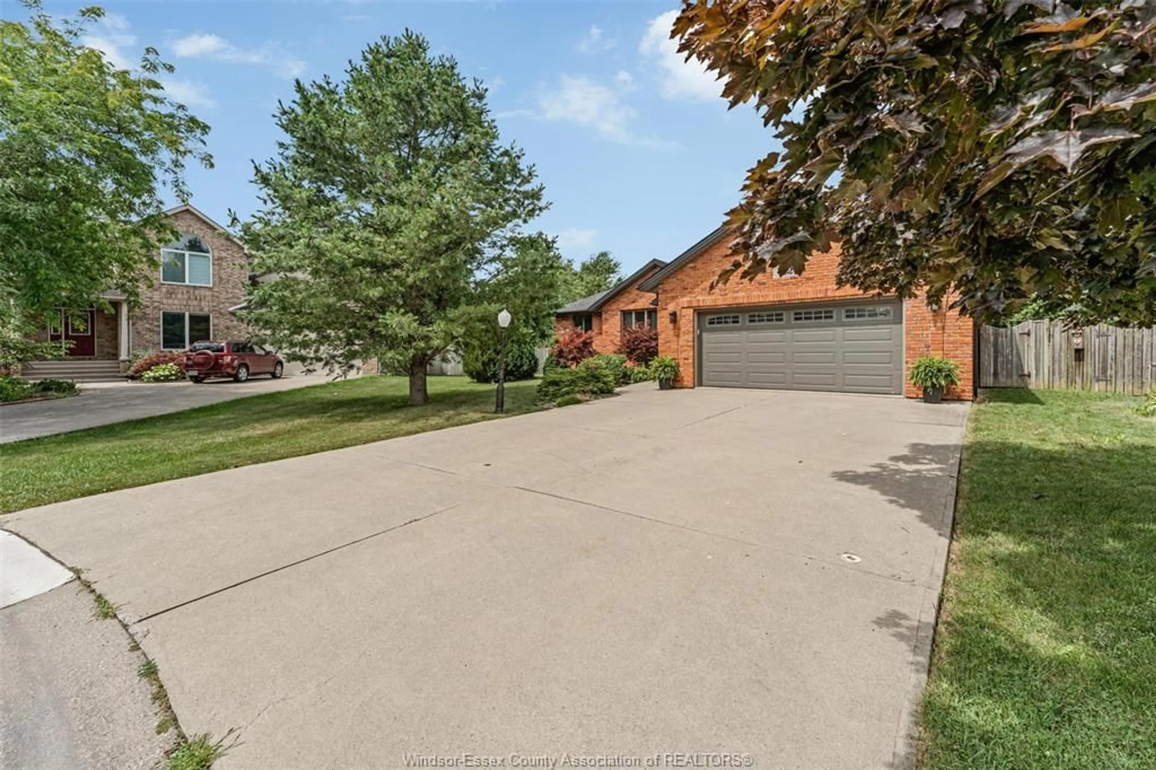 A pic from outside/outdoor area/front of a property/back of a property/a pic from drone, street for 32 MEADOW LANE, Essex Ontario N8M 3C5