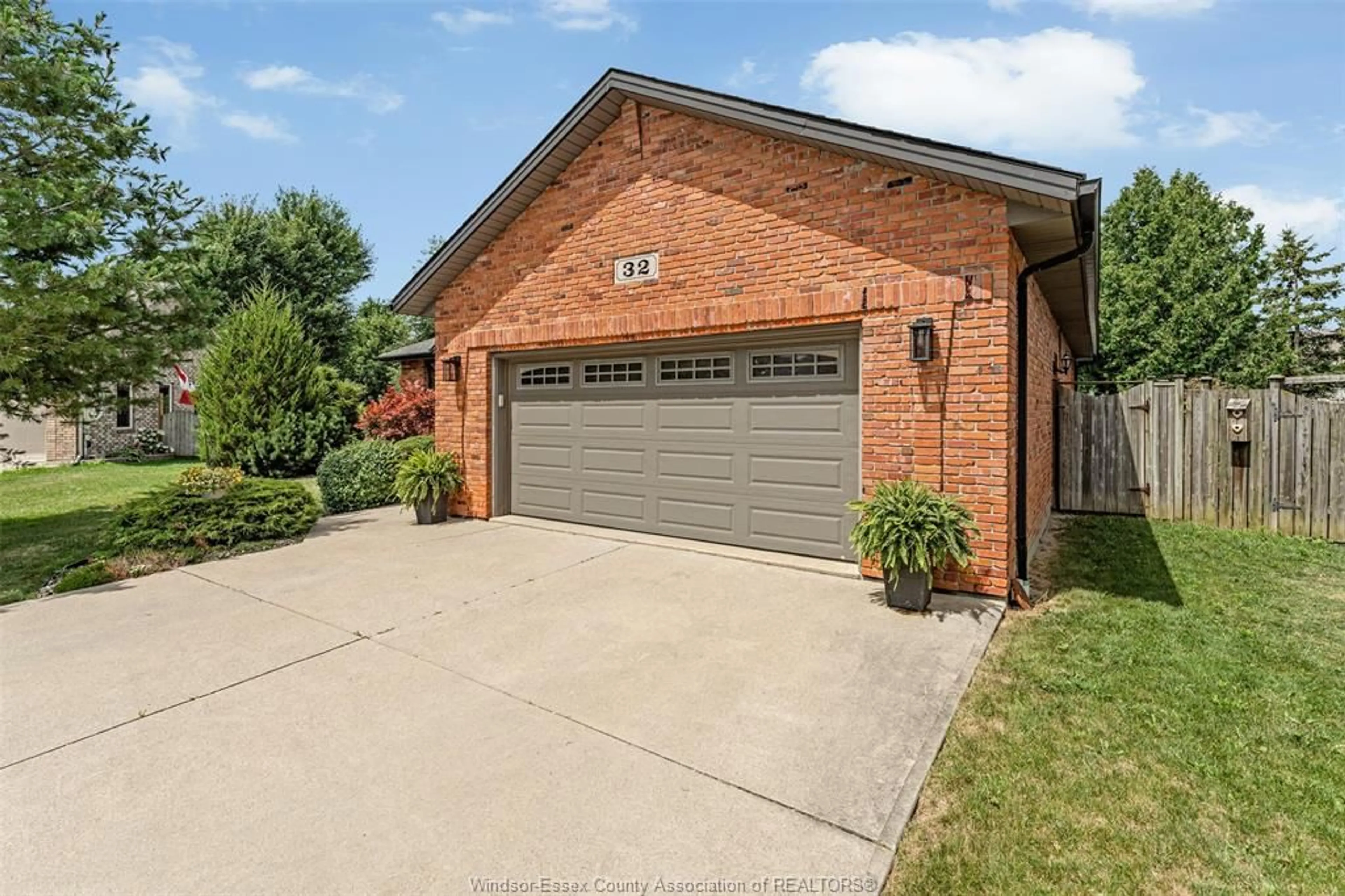 Home with brick exterior material, street for 32 MEADOW LANE, Essex Ontario N8M 3C5