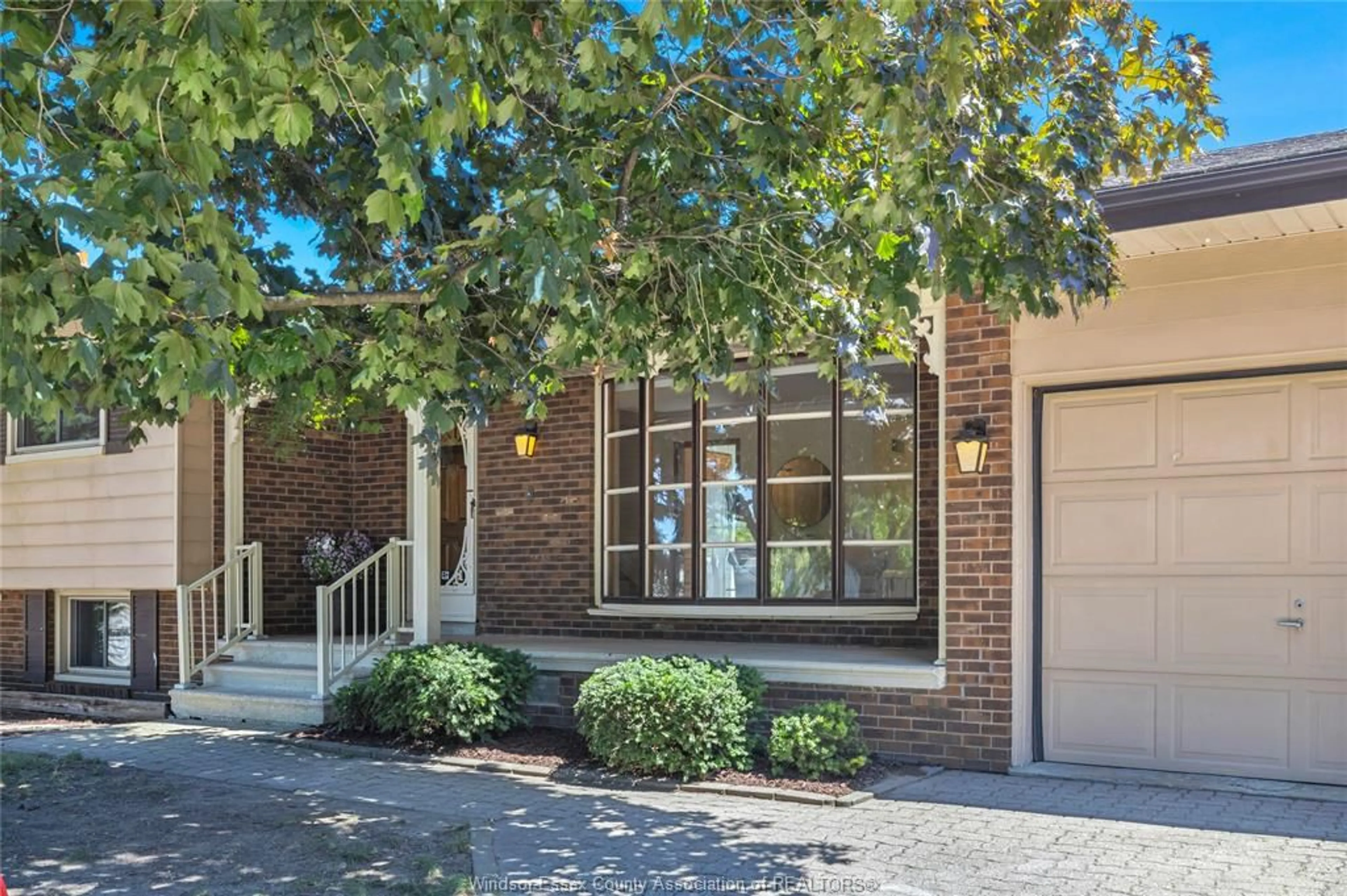 Home with brick exterior material, street for 302 WOODRIDGE, Tecumseh Ontario N8N 3A8