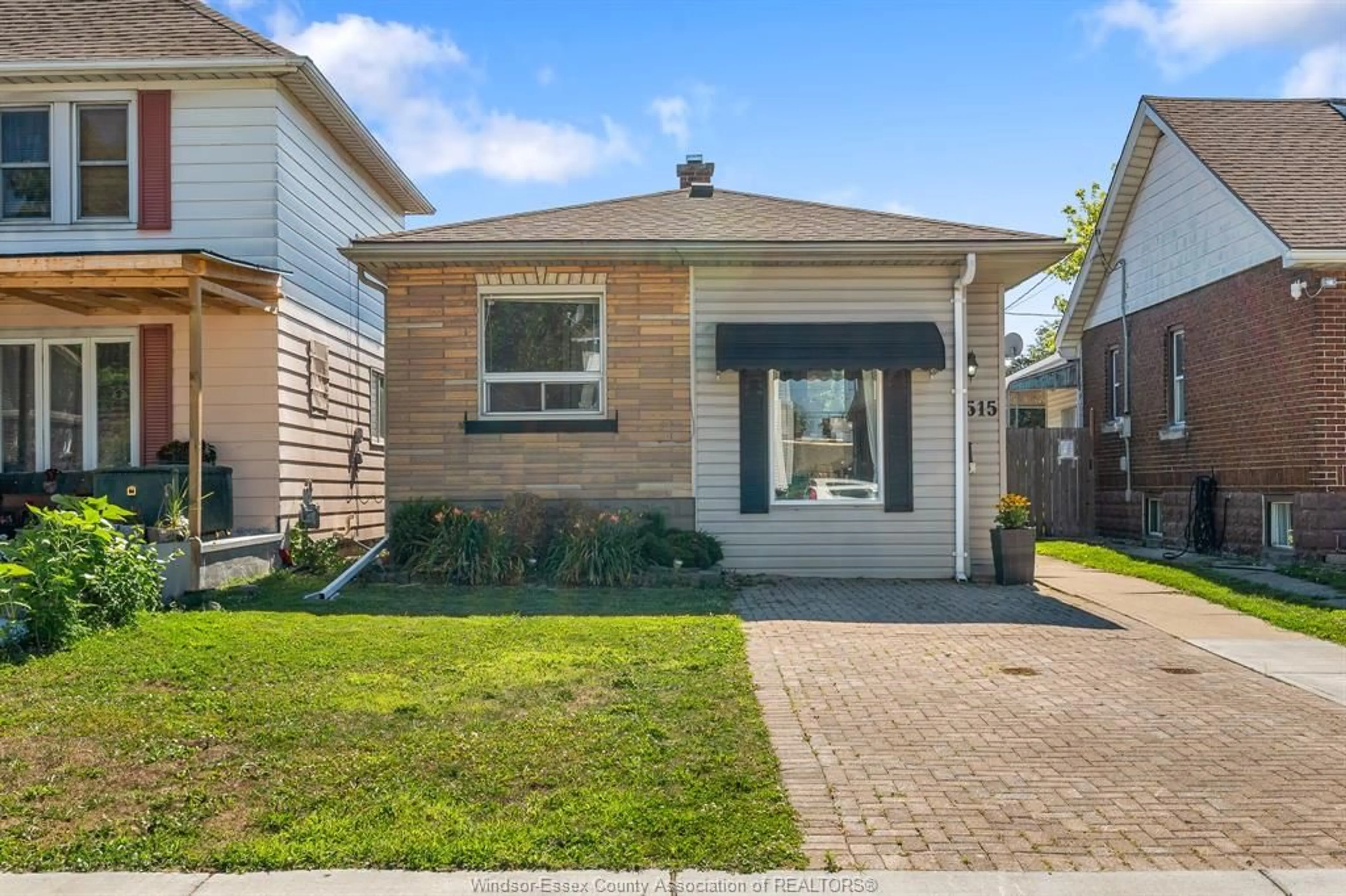 Home with brick exterior material, street for 1515 AUBIN Rd, Windsor Ontario N8Y 4G1