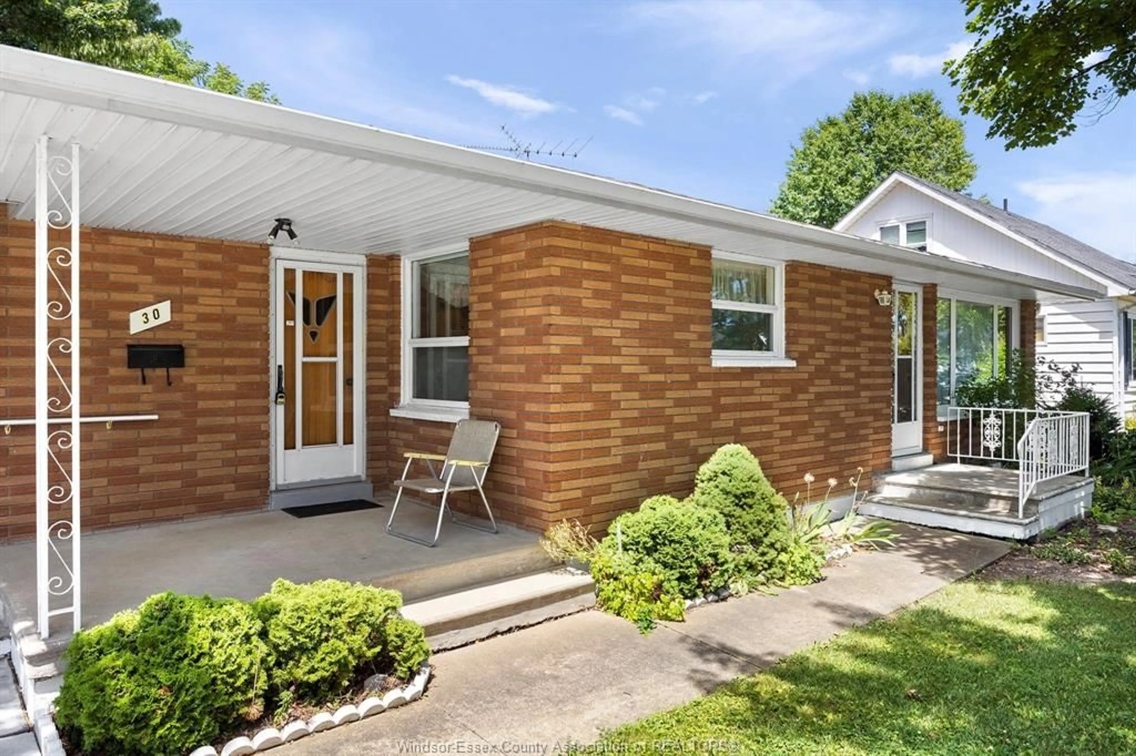 Home with brick exterior material, street for 30 CRAWFORD Ave, Tilbury Ontario N0P 2L0