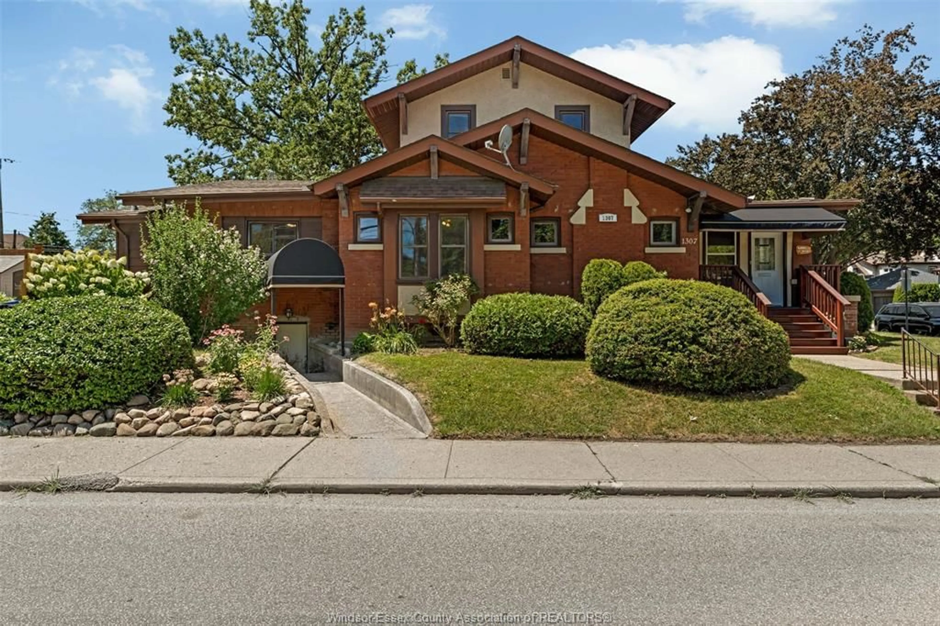 Home with brick exterior material, street for 1307 PELISSIER St, Windsor Ontario N8X 1A4