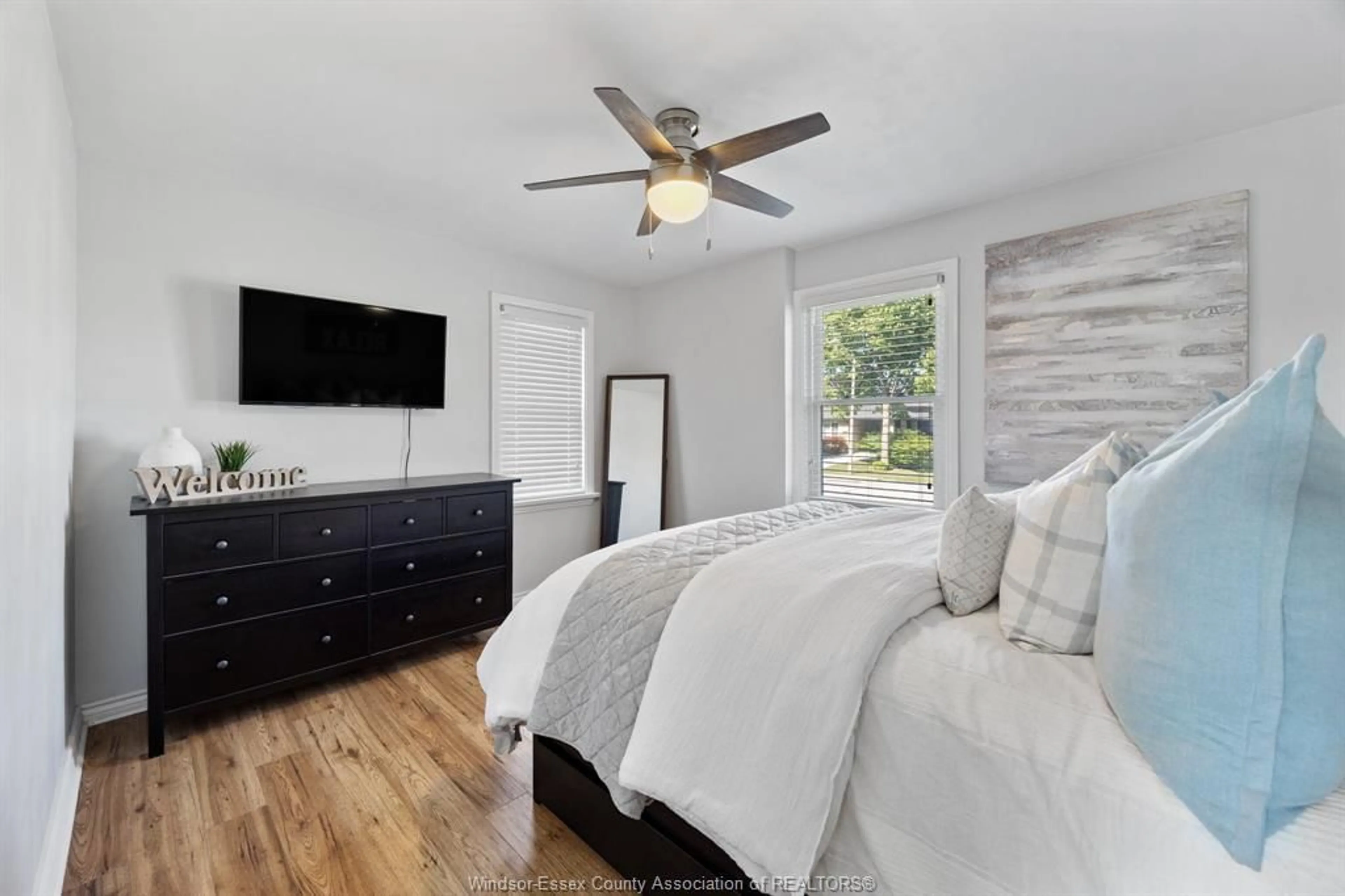 Bedroom with bed, wood/laminate floor for 3521 LONGFELLOW, Windsor Ontario N9E 2M1