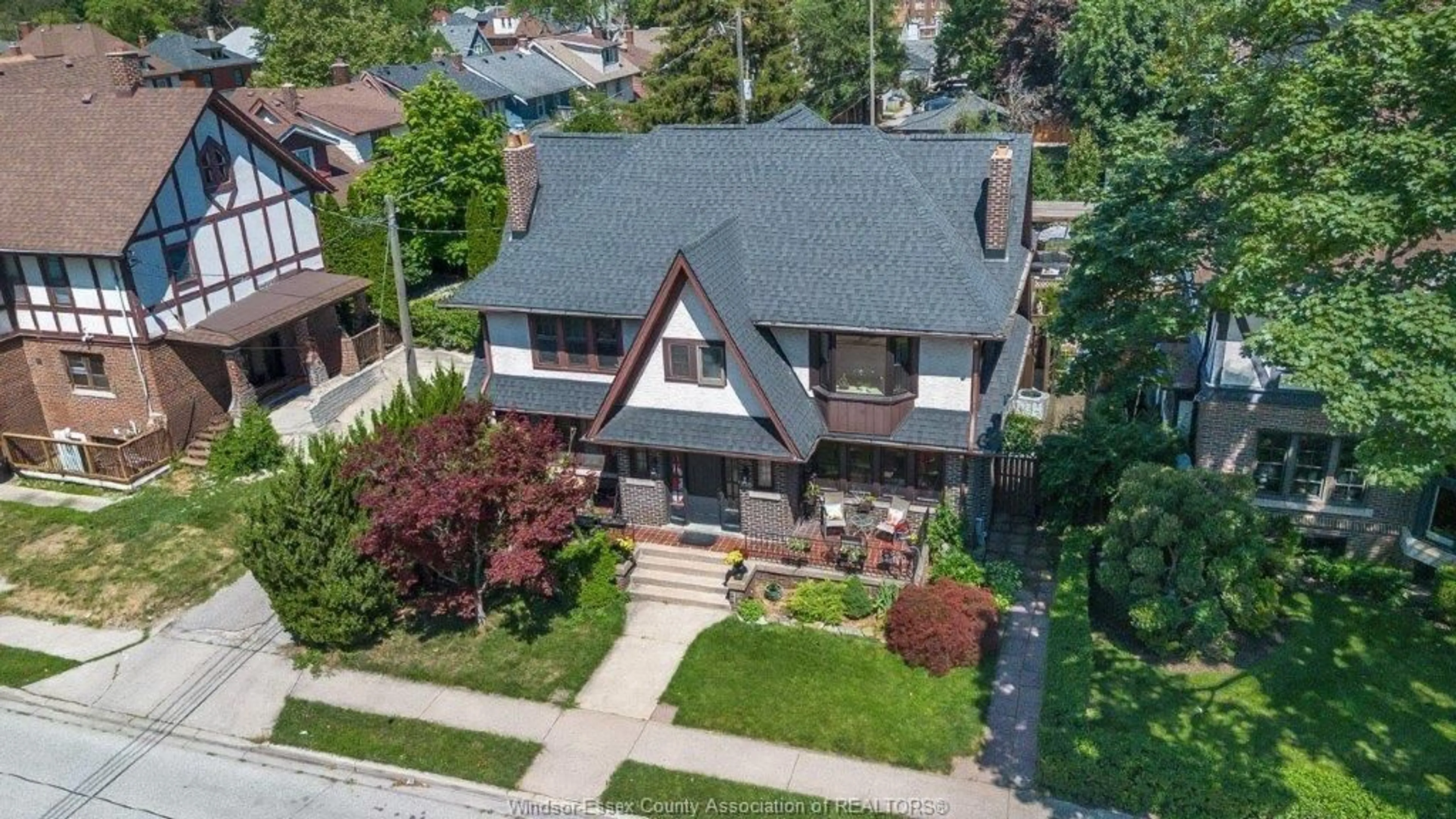 A pic from outside/outdoor area/front of a property/back of a property/a pic from drone, street for 240 PINE, Windsor Ontario N9A 6C9