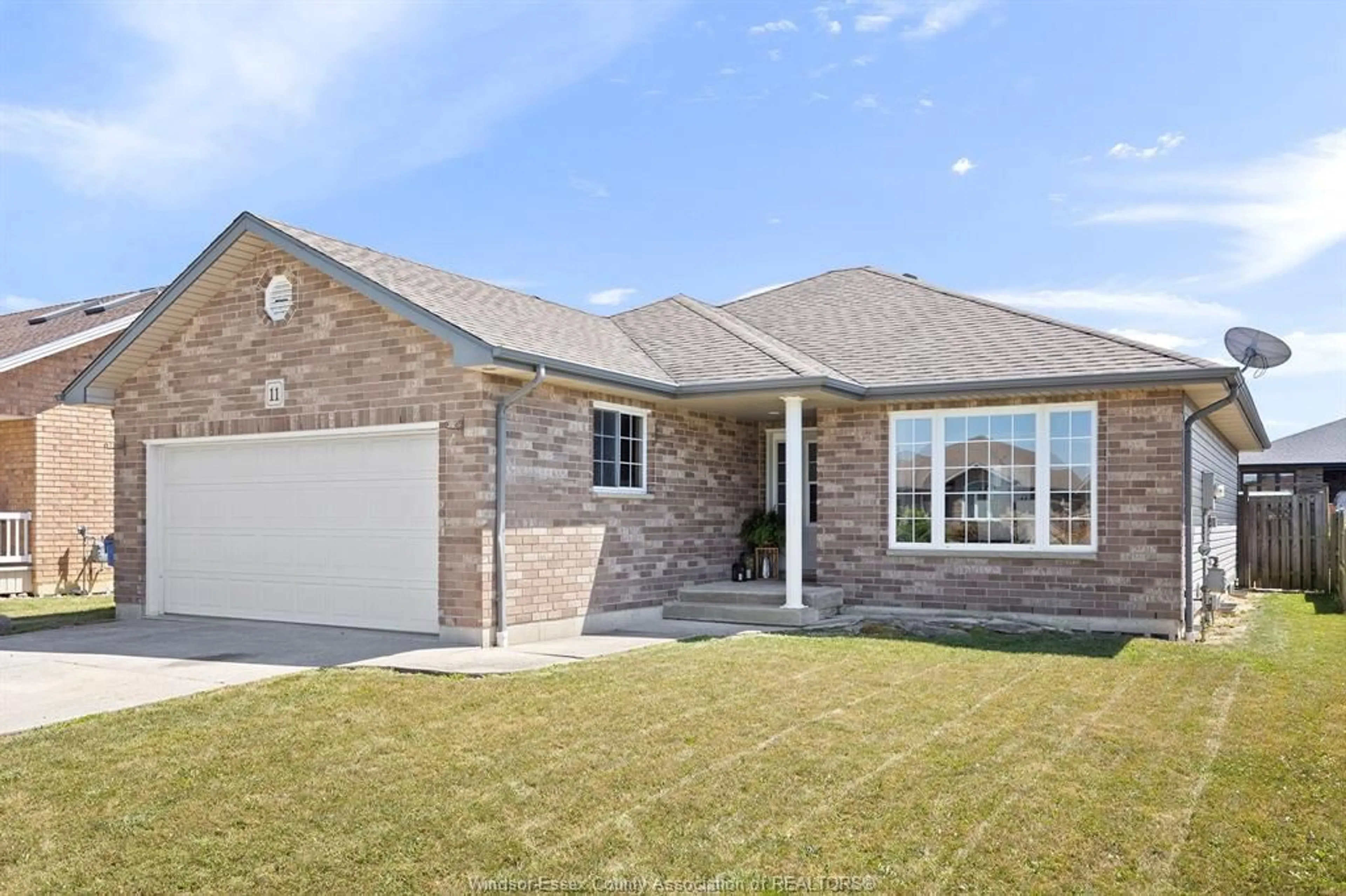 Home with brick exterior material, street for 11 HOMESTEADS Dr, Tilbury Ontario N0P 2L0