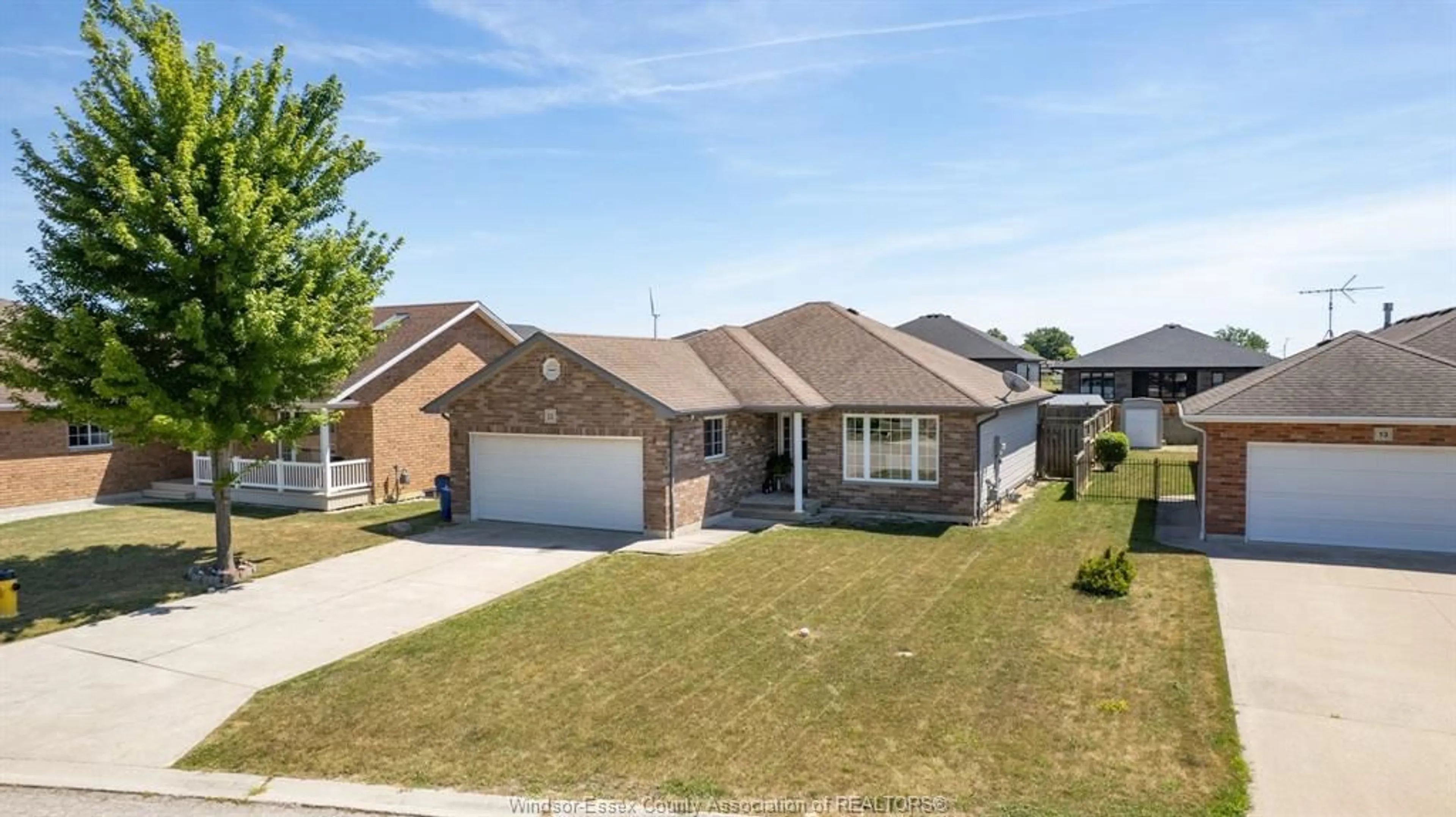 Home with brick exterior material, street for 11 HOMESTEADS Dr, Tilbury Ontario N0P 2L0