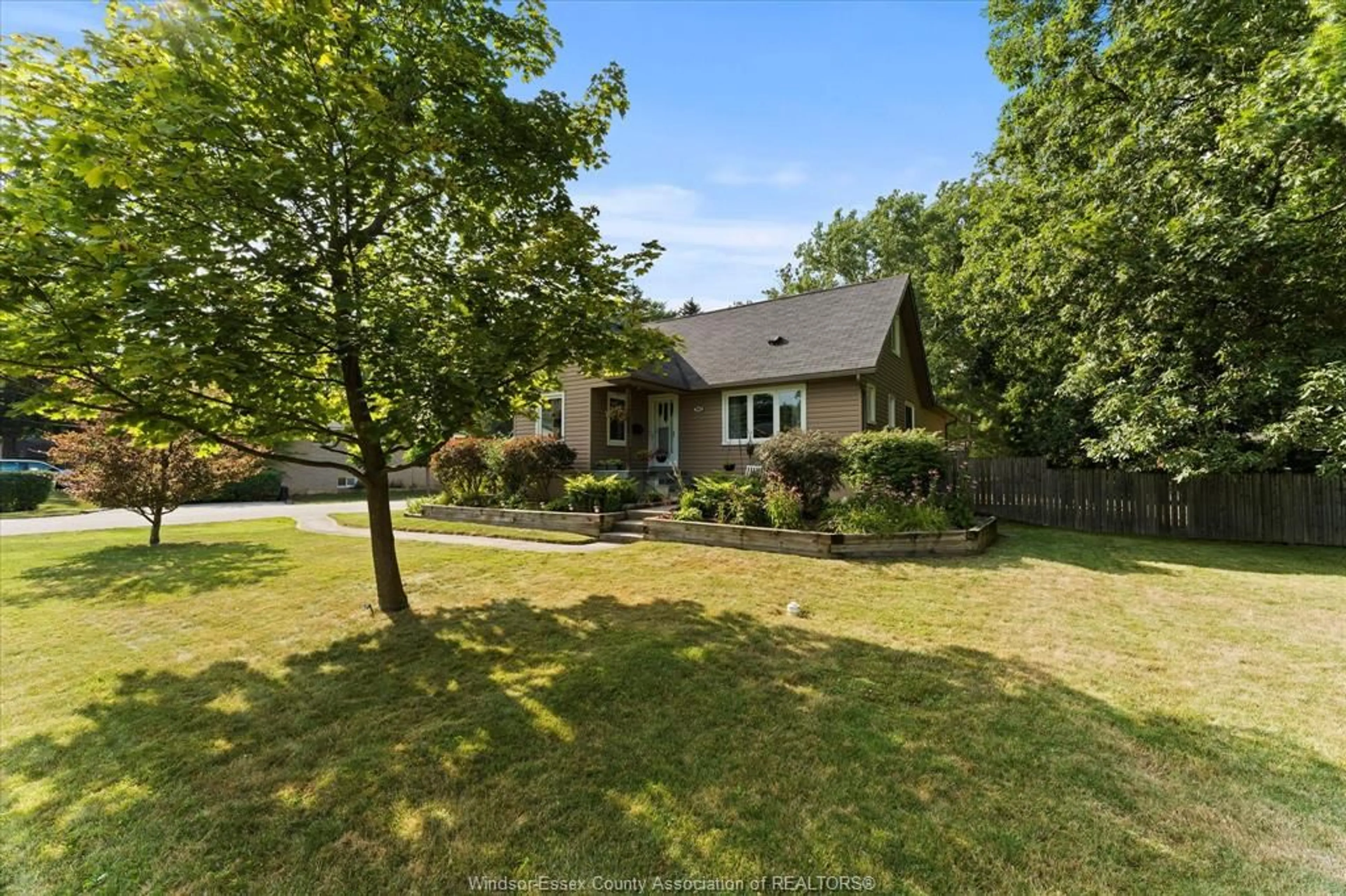 A pic from outside/outdoor area/front of a property/back of a property/a pic from drone, street for 740 COUSINEAU Rd, Windsor Ontario N9G 1V7