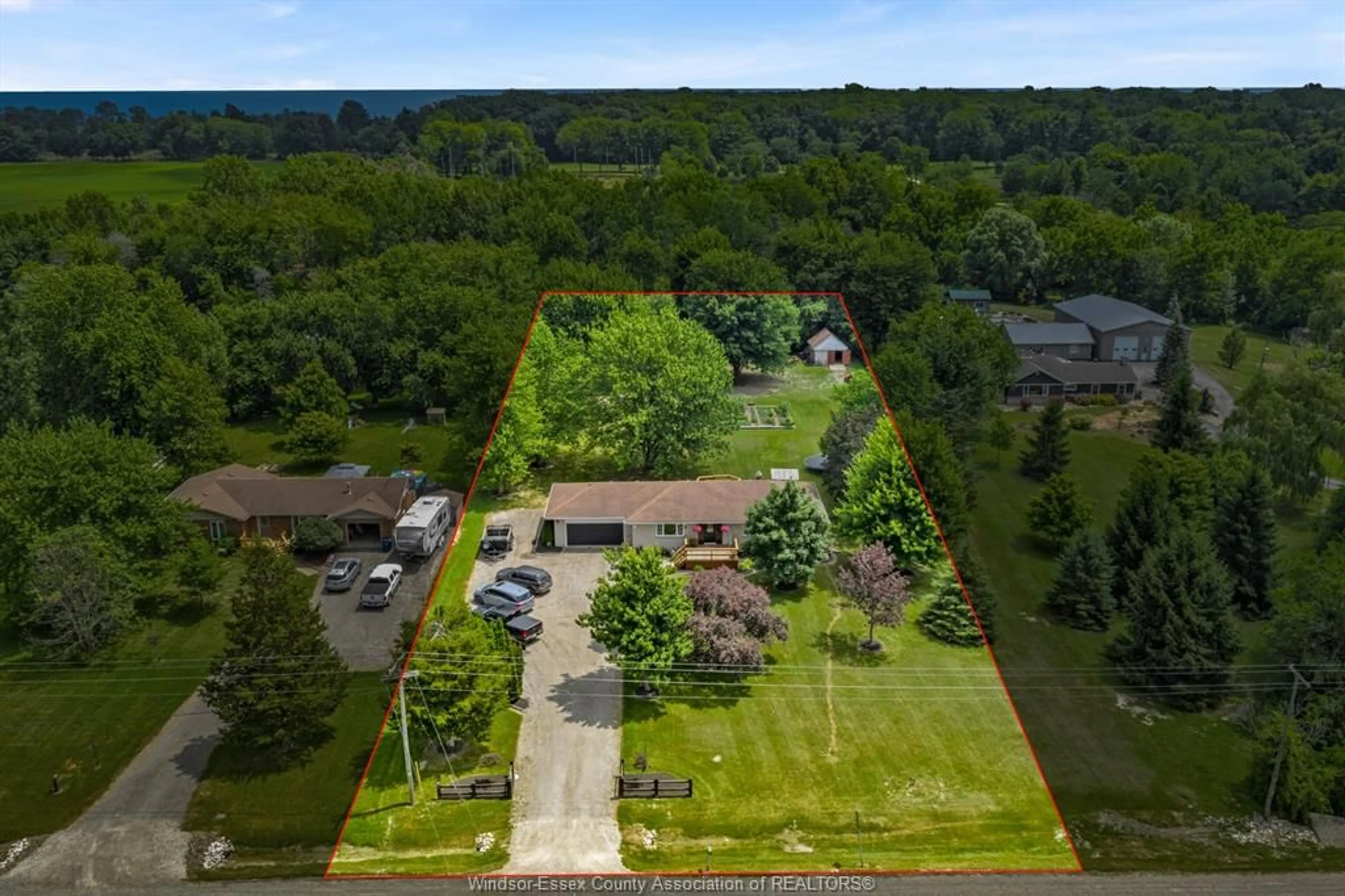 A pic from outside/outdoor area/front of a property/back of a property/a pic from drone, forest/trees view for 826 TALBOT TRAIL, Wheatley Ontario N0P 2P0