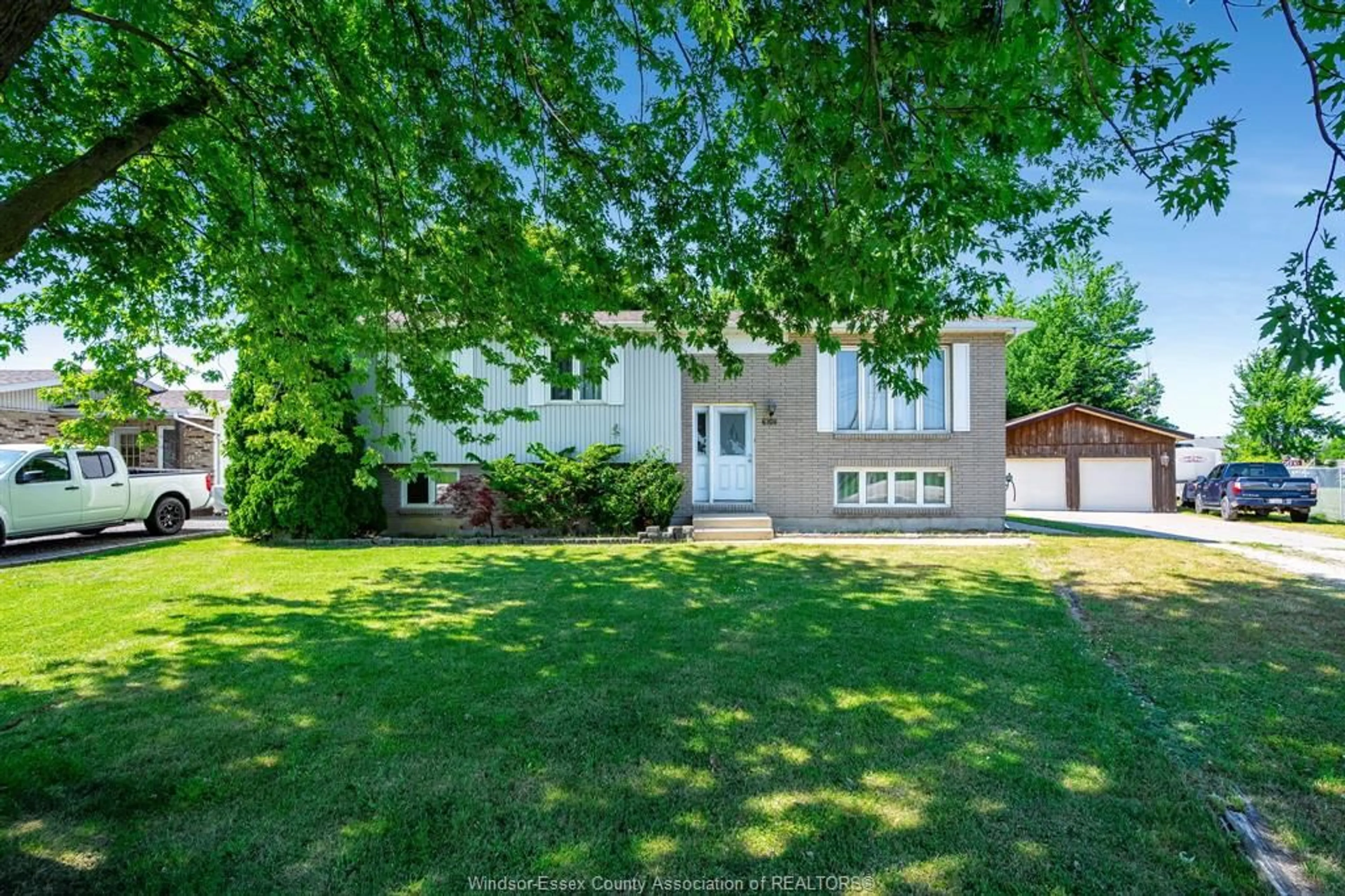 A pic from outside/outdoor area/front of a property/back of a property/a pic from drone, street for 6108 COUNTY RD 46, Lakeshore Ontario N0P 1J0