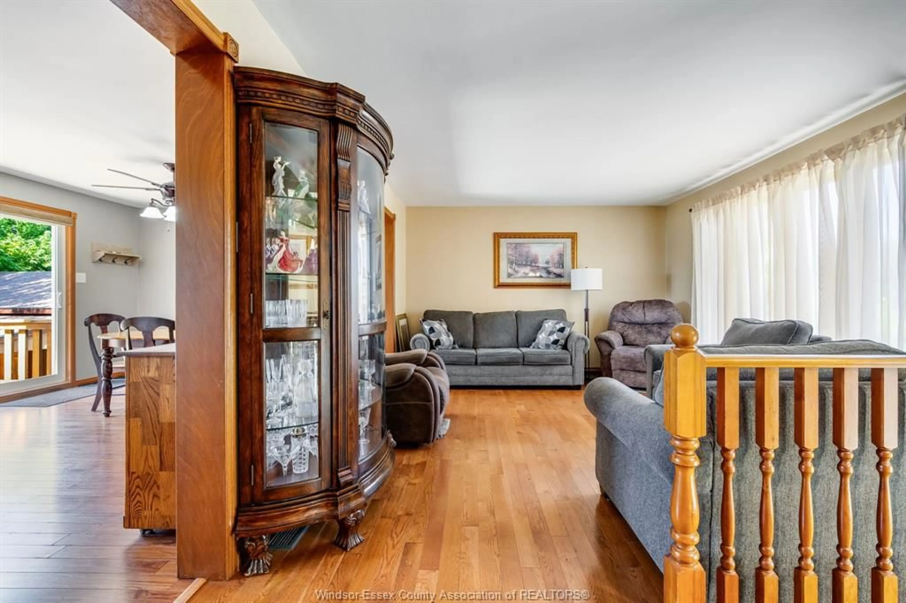 Living room with furniture, wood/laminate floor for 6108 COUNTY RD 46, Lakeshore Ontario N0P 1J0