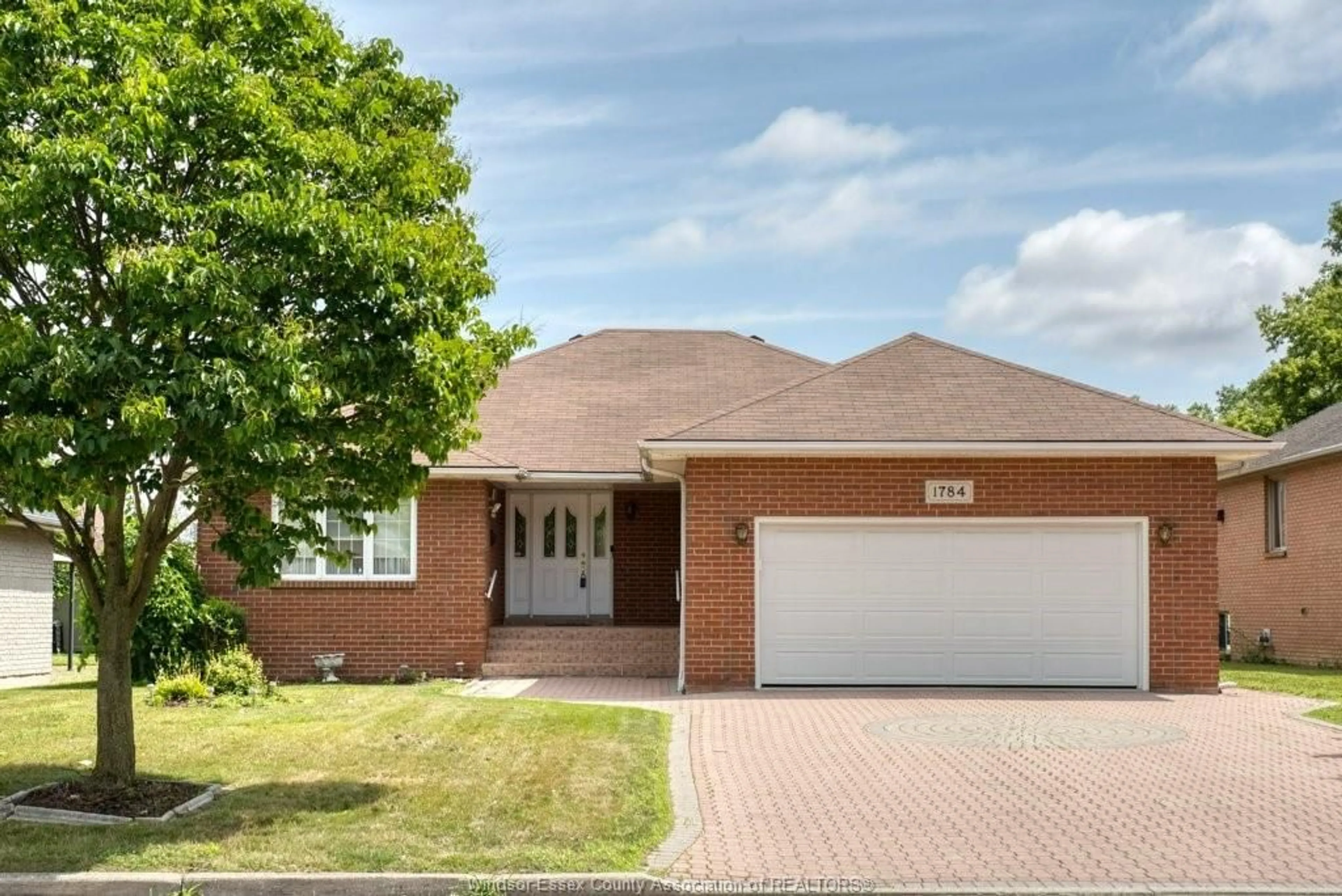 Home with brick exterior material, street for 1784 ST. CLAIR, Windsor Ontario N9B 3T7