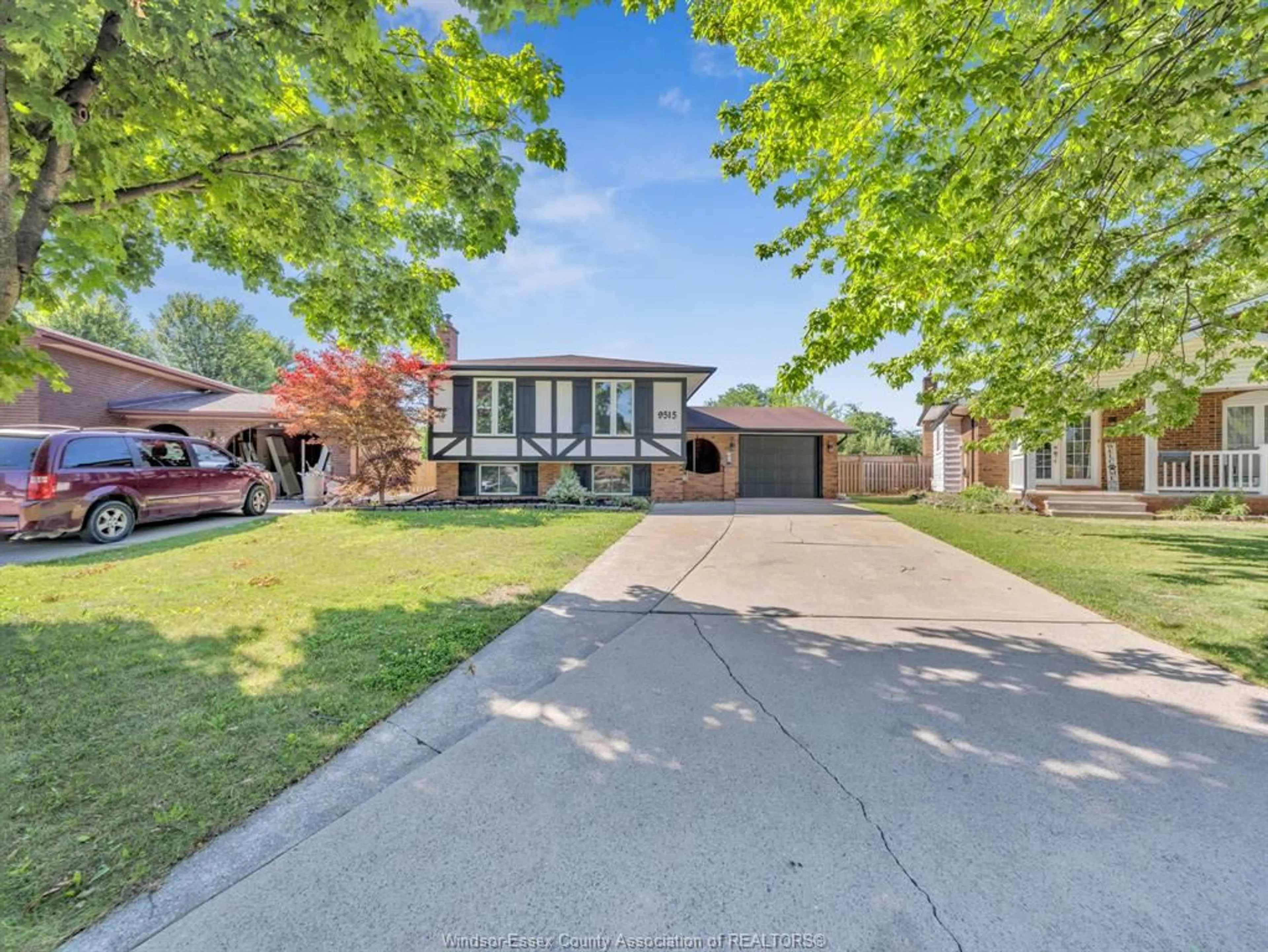 A pic from outside/outdoor area/front of a property/back of a property/a pic from drone, street for 9515 KERBY Rd #A & B, Windsor Ontario N8R 1K1