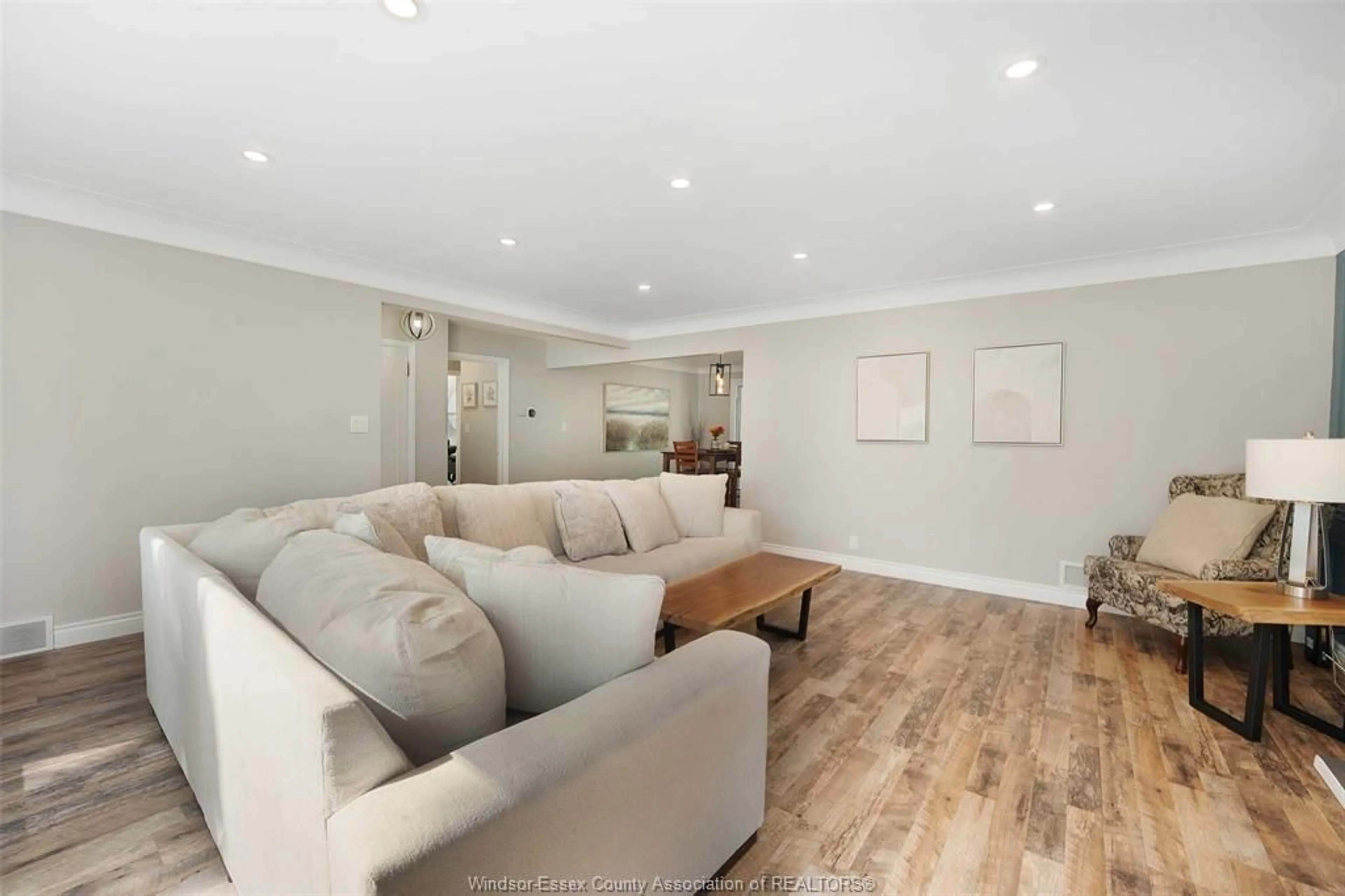 Living room with furniture, wood/laminate floor for 2898 Alexandra Ave, Windsor Ontario N9E 2J7