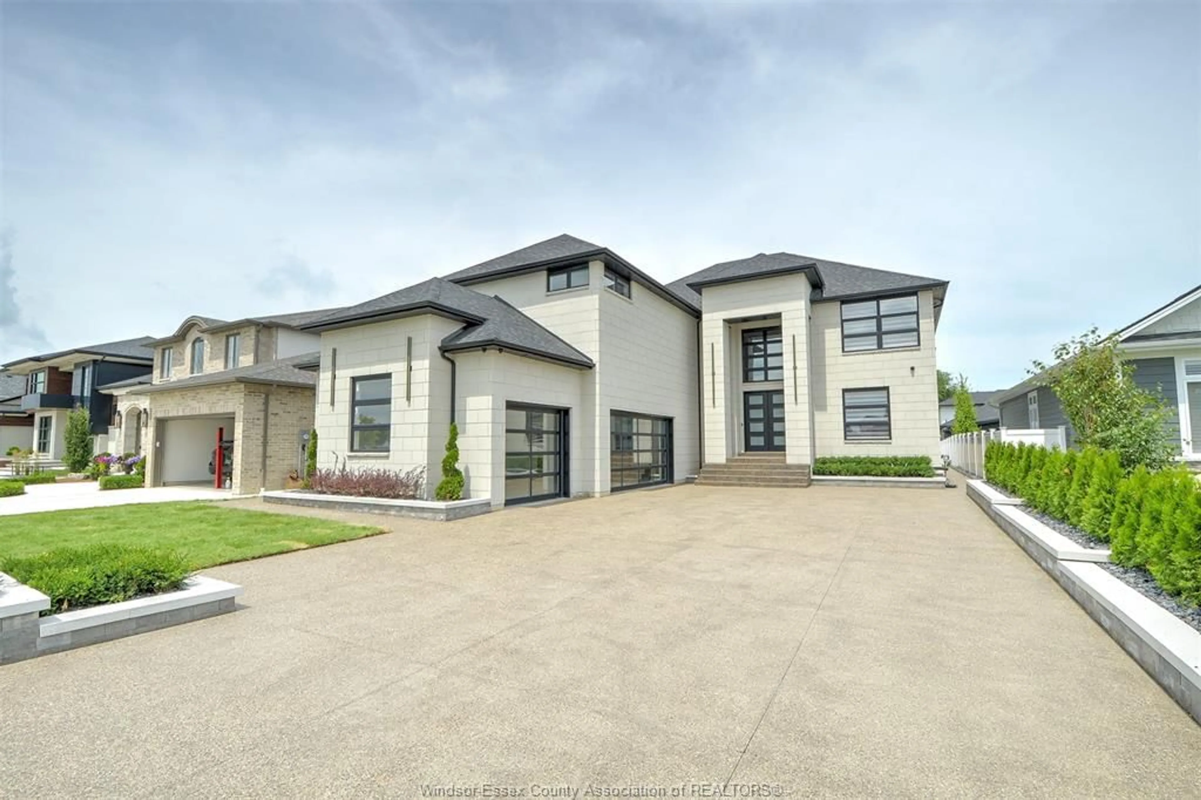 Home with vinyl exterior material, street for 311 WATER Ave, Lakeshore Ontario N0R 1A0