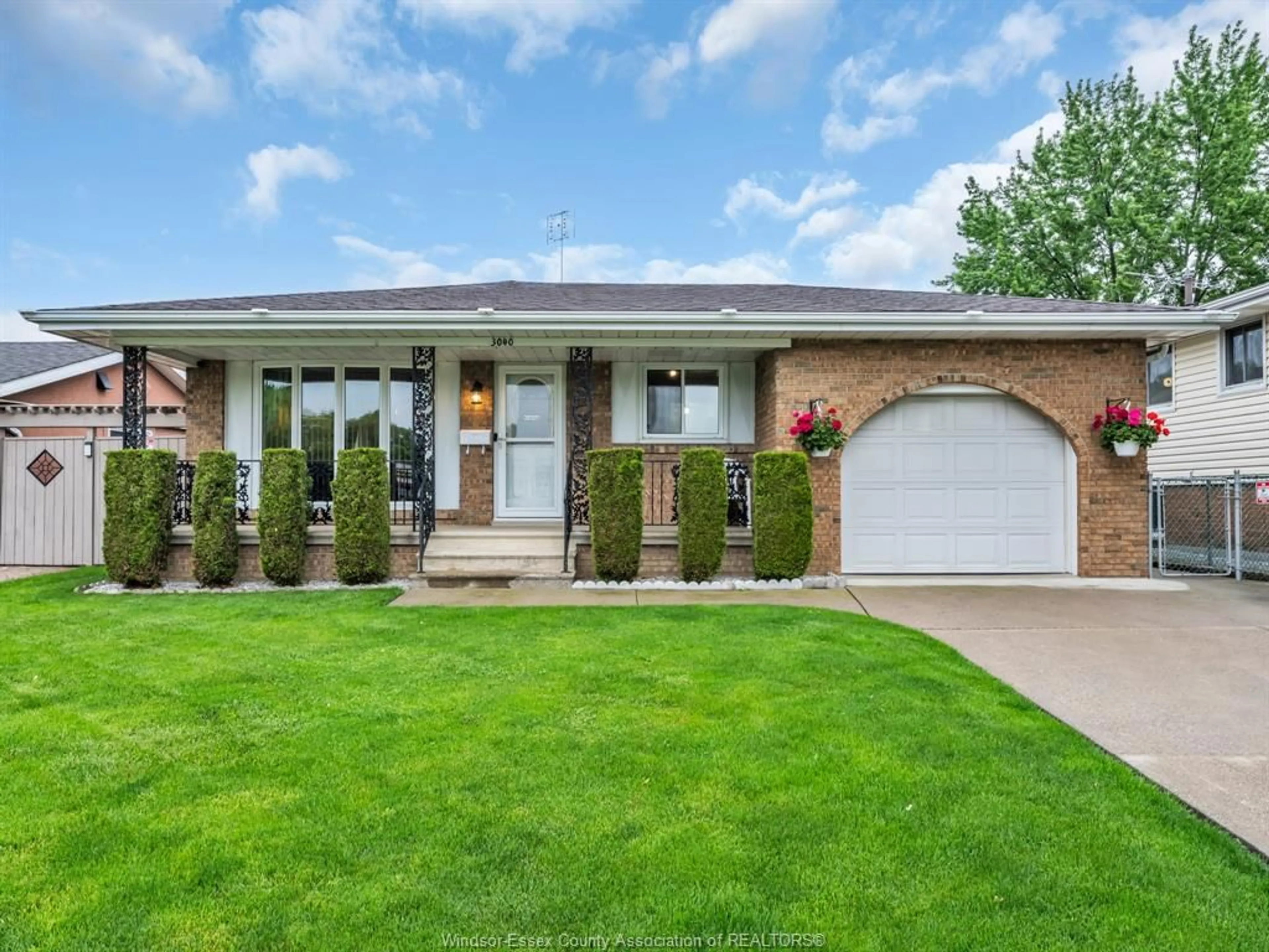 Home with brick exterior material, street for 3040 FOREST GLADE Dr, Windsor Ontario N8R 1L5