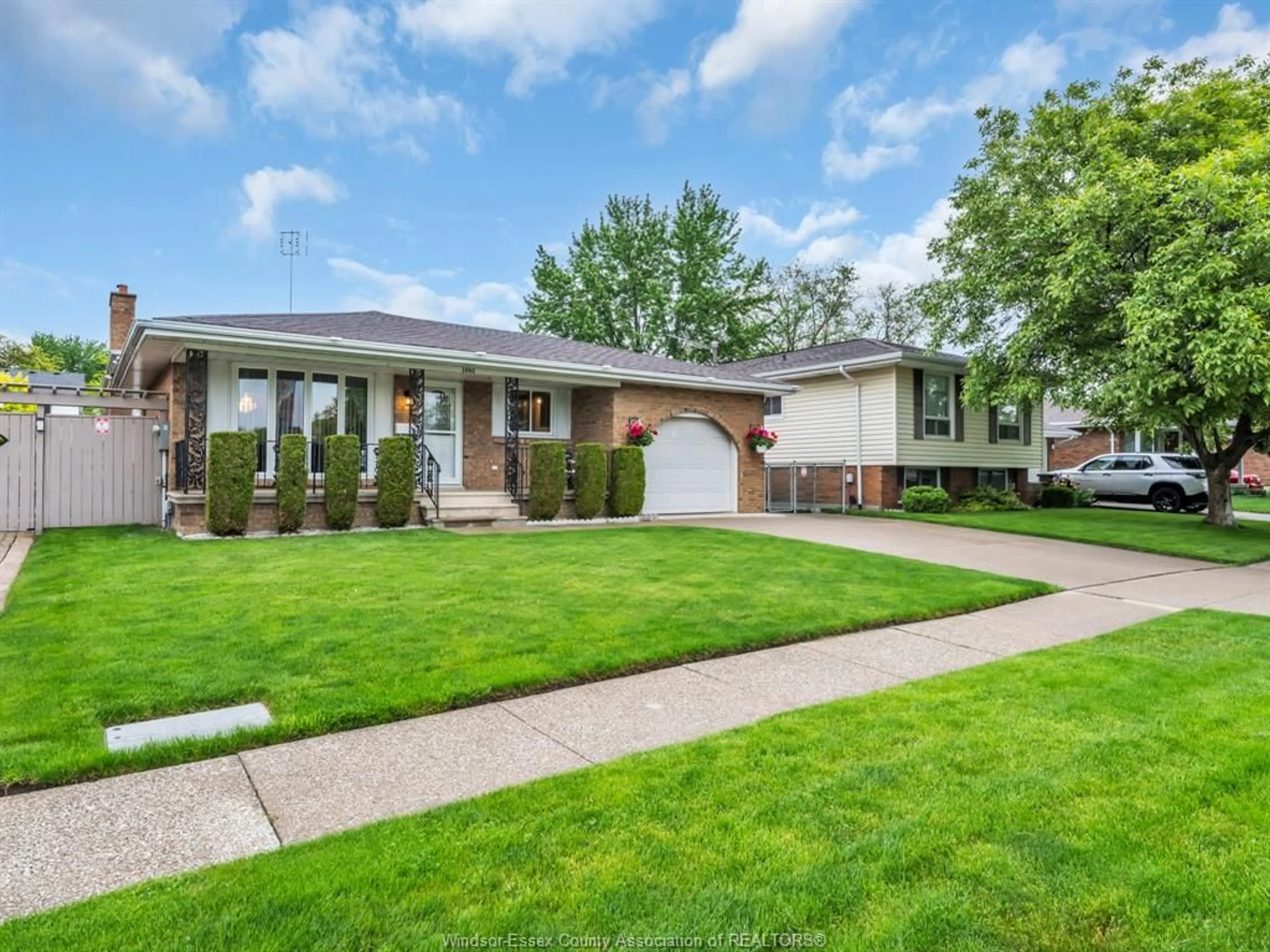 Home with brick exterior material, street for 3040 FOREST GLADE Dr, Windsor Ontario N8R 1L5