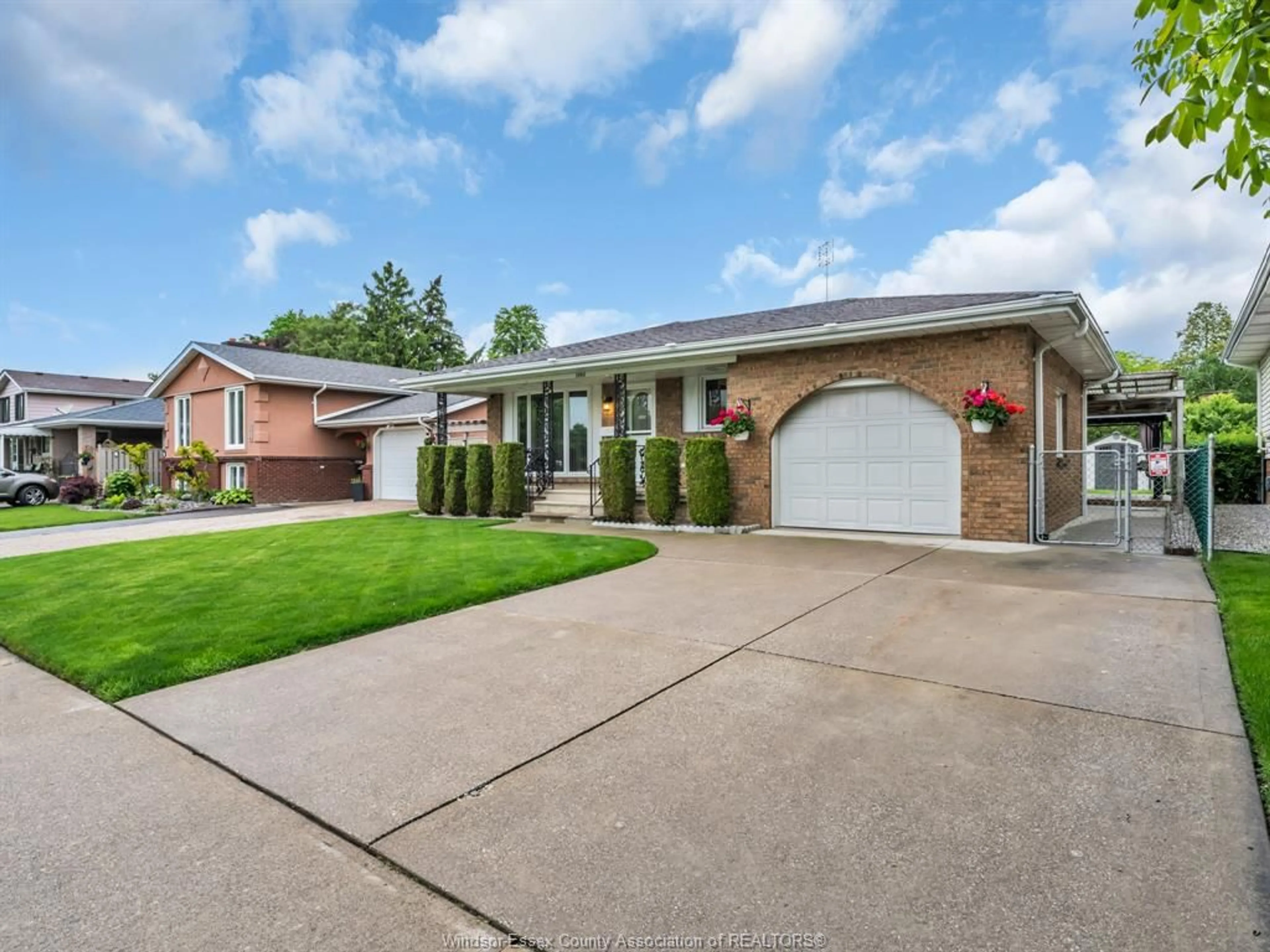 Home with brick exterior material, street for 3040 FOREST GLADE Dr, Windsor Ontario N8R 1L5