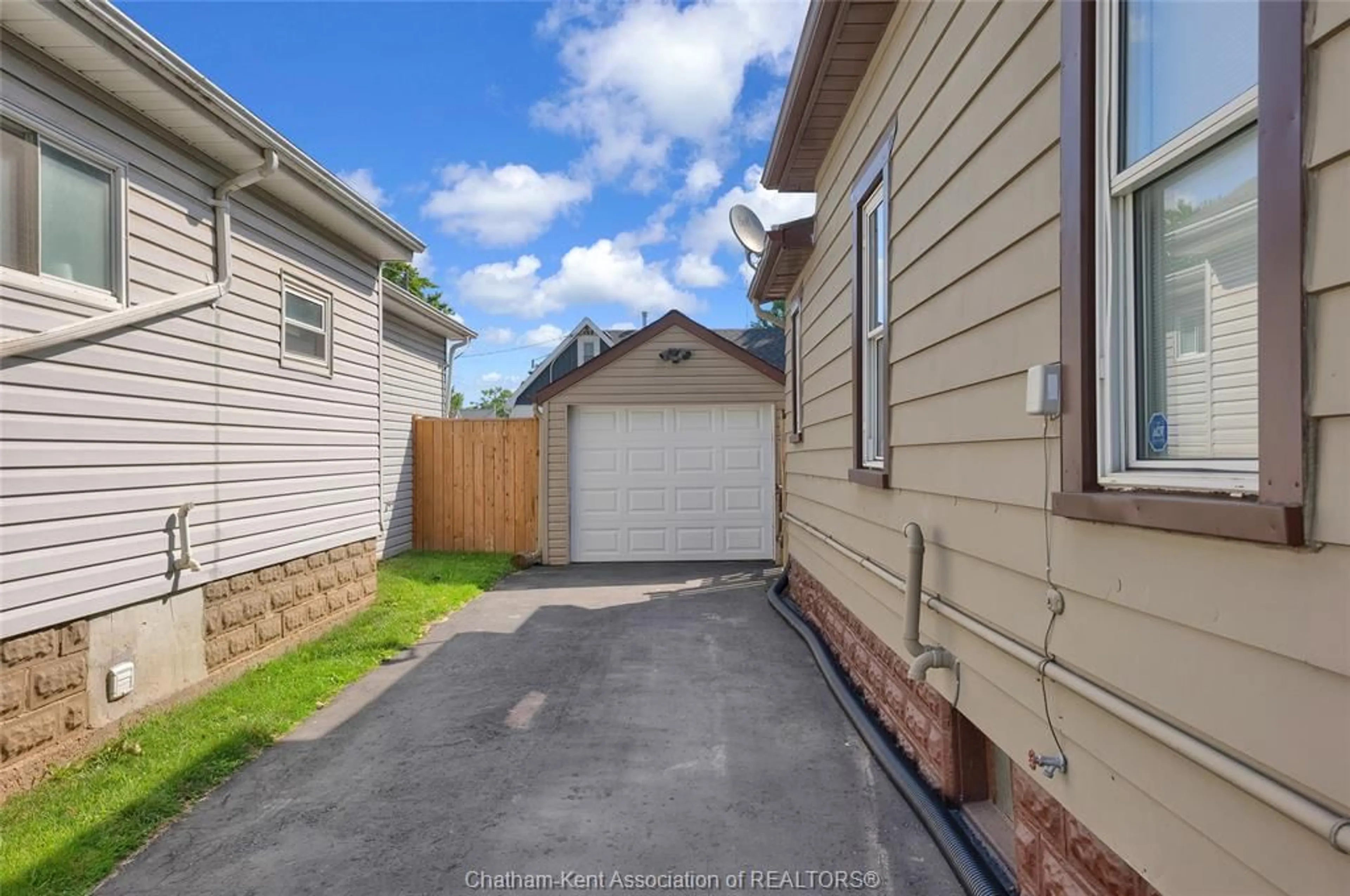A pic from outside/outdoor area/front of a property/back of a property/a pic from drone, street for 61 Sheldon Ave, Chatham Ontario N7L 3M6