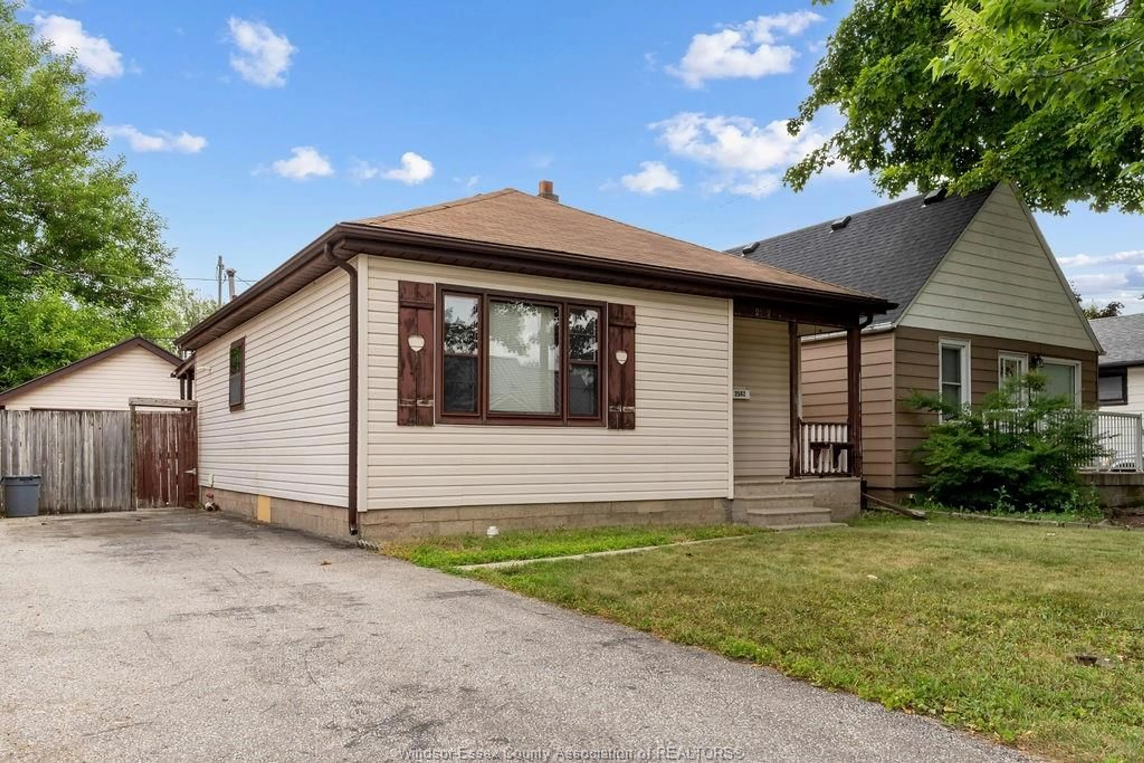 Home with vinyl exterior material, street for 2542 TOURANGEAU, Windsor Ontario N8W 4N9