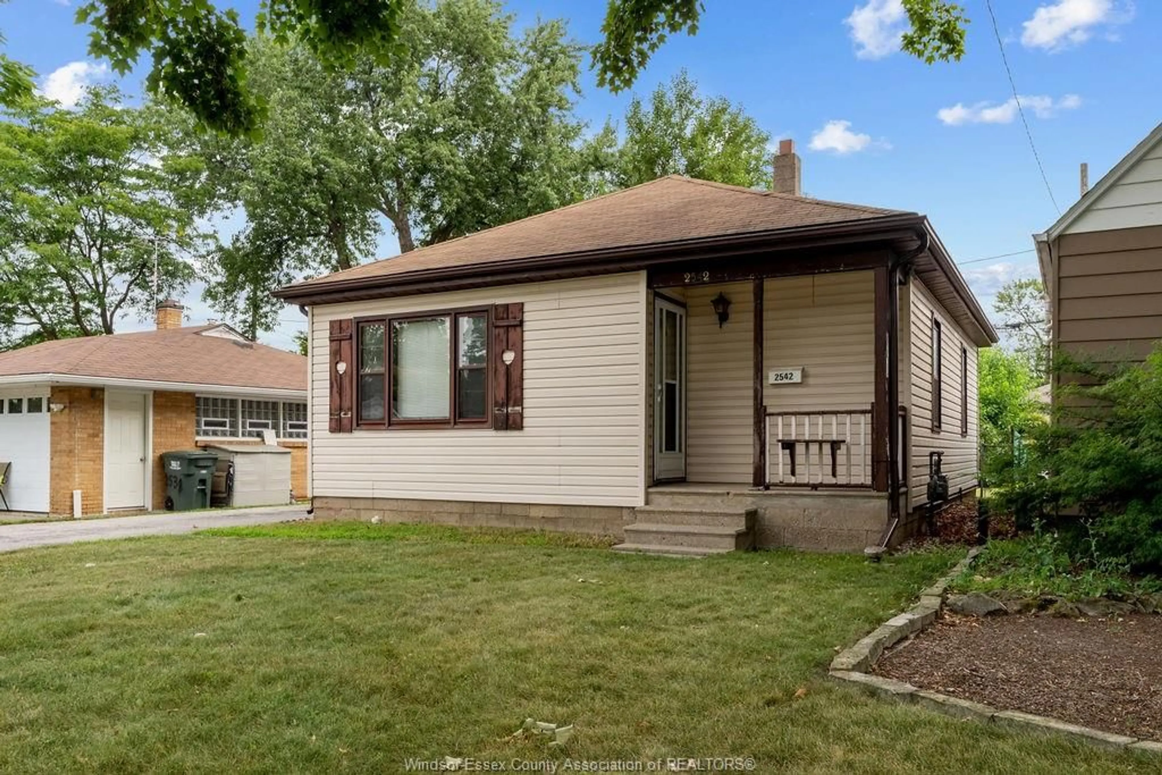 Home with vinyl exterior material, street for 2542 TOURANGEAU, Windsor Ontario N8W 4N9