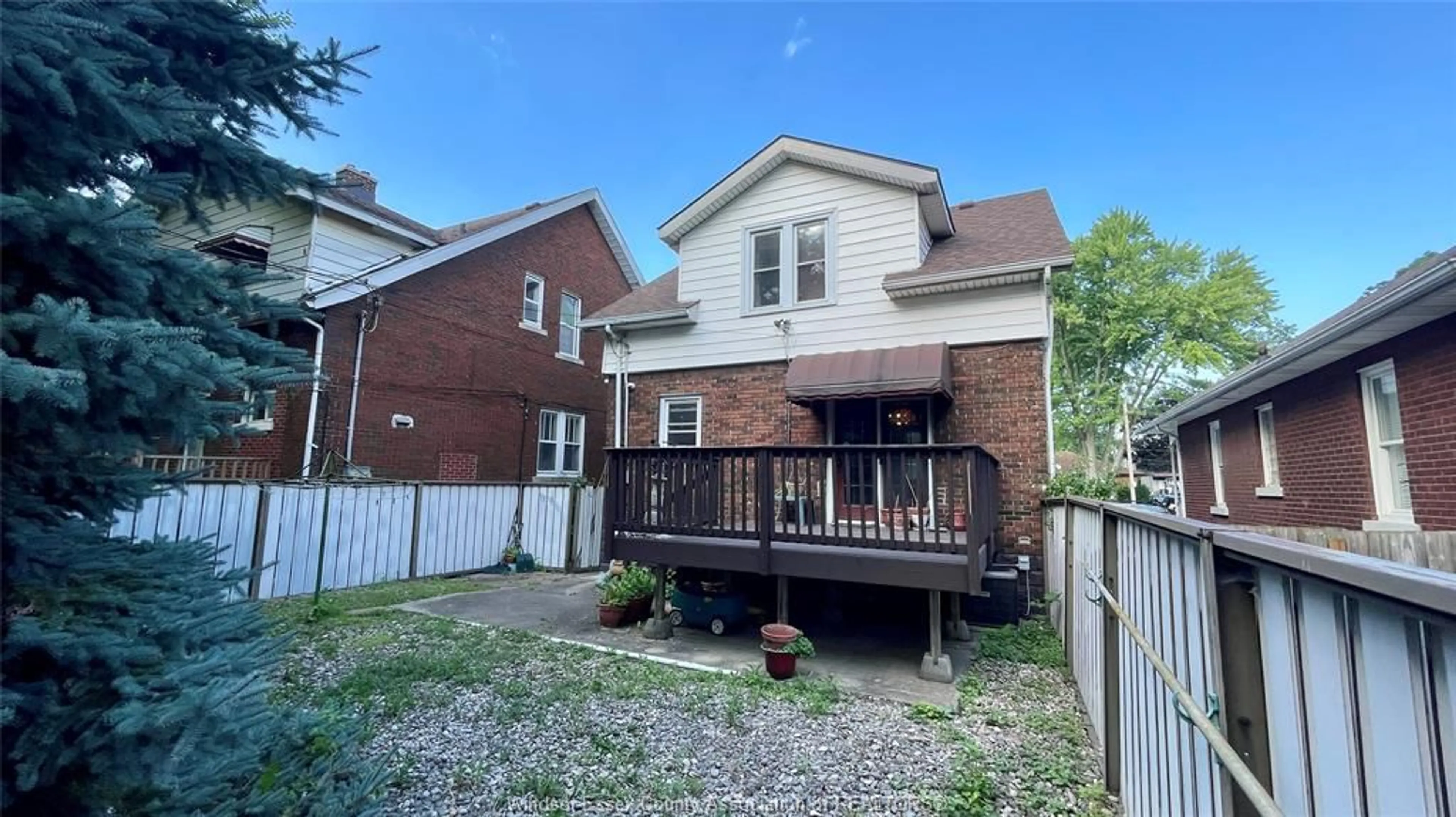 A pic from outside/outdoor area/front of a property/back of a property/a pic from drone, street for 741 Partington, Windsor Ontario N9B 2N6