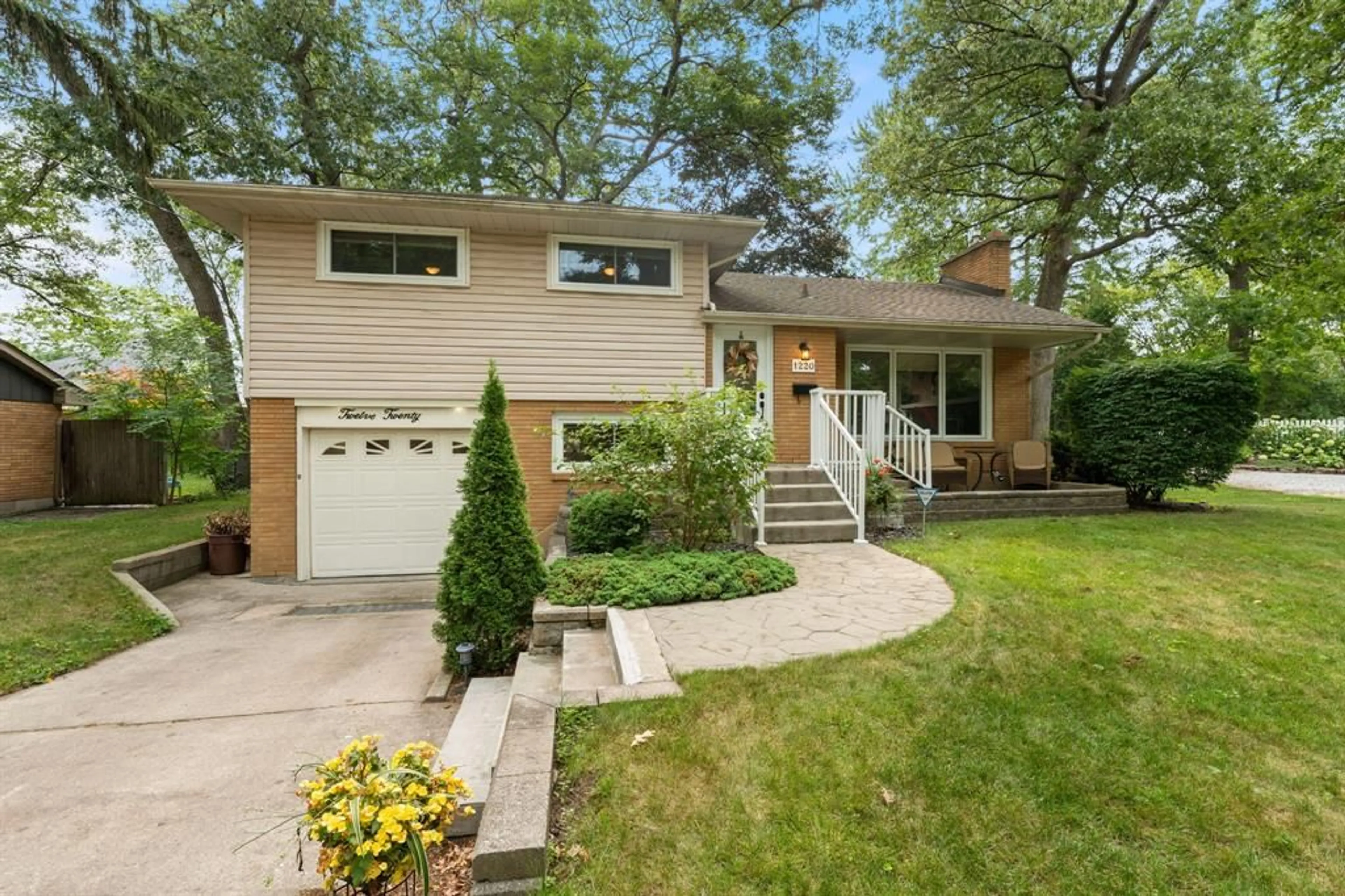 Home with vinyl exterior material, street for 1220 RIDGEWOOD Dr, Sarnia Ontario N7V 3R1