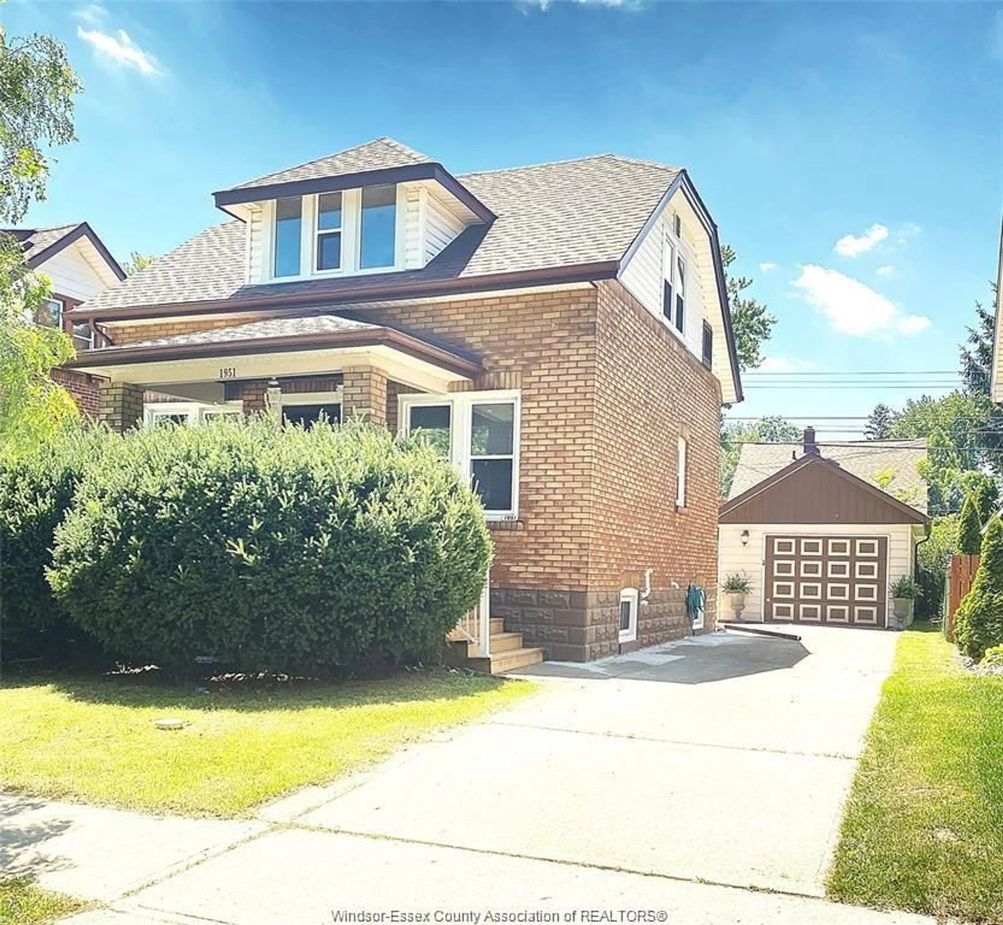 Home with brick exterior material, street for 1951 TOURANGEAU Rd, Windsor Ontario N8W 4N4