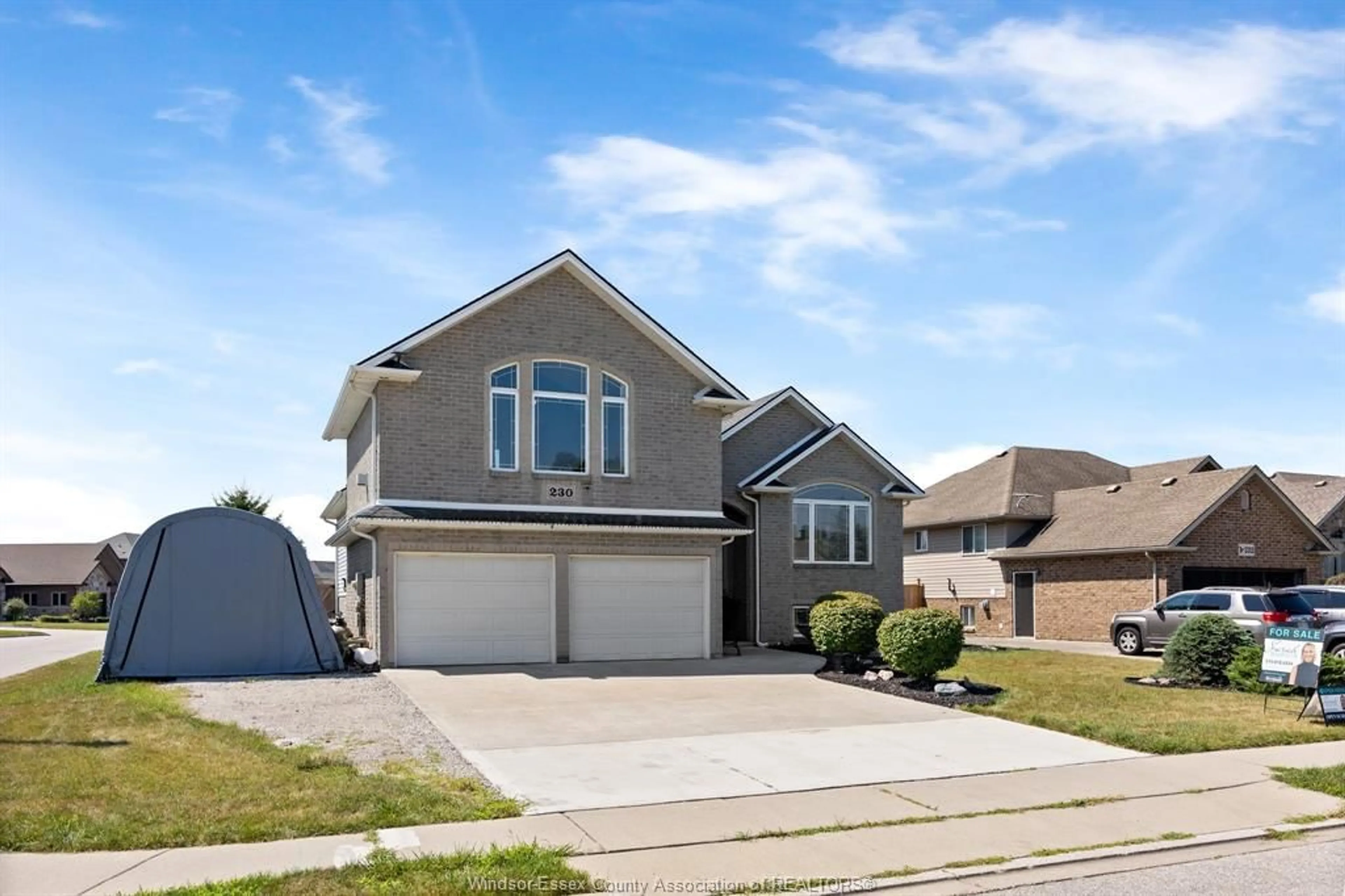 Home with vinyl exterior material, street for 230 ST PETER, Lakeshore Ontario N0R 1A0