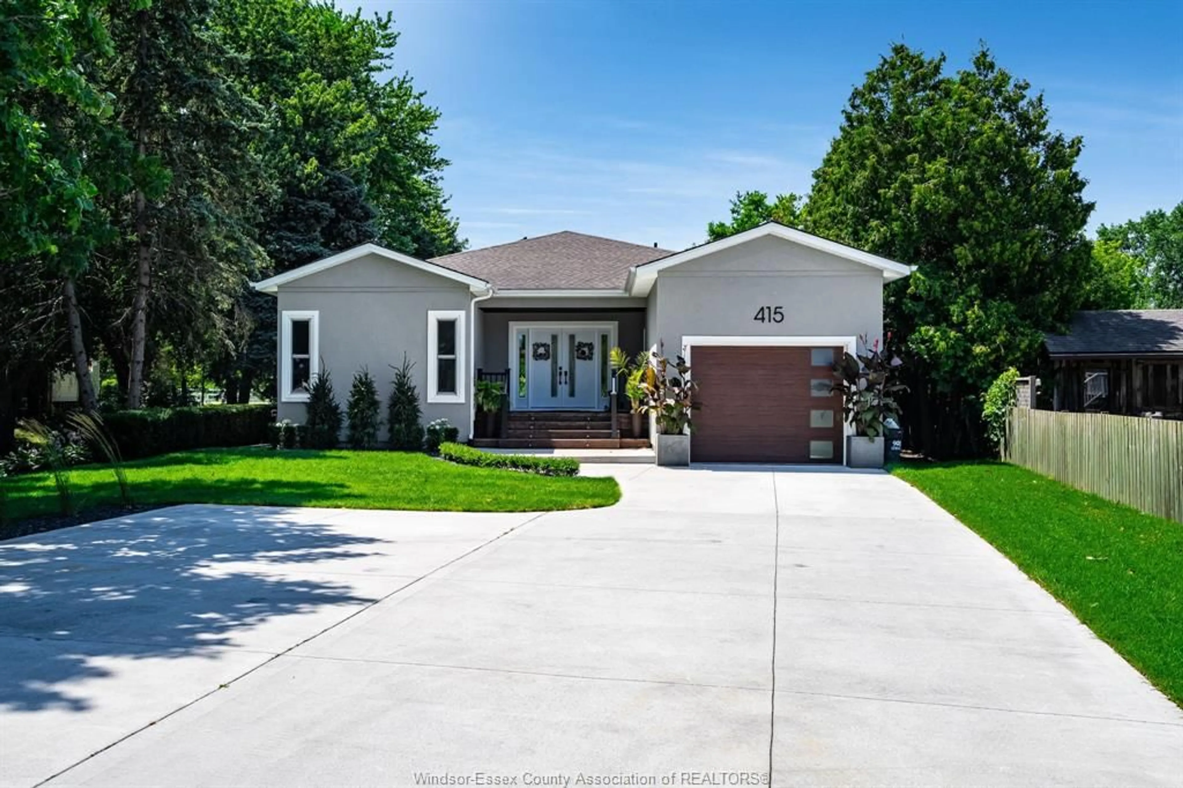 Home with vinyl exterior material, street for 415 EAST PUCE Rd, Belle River Ontario N8L 0E3