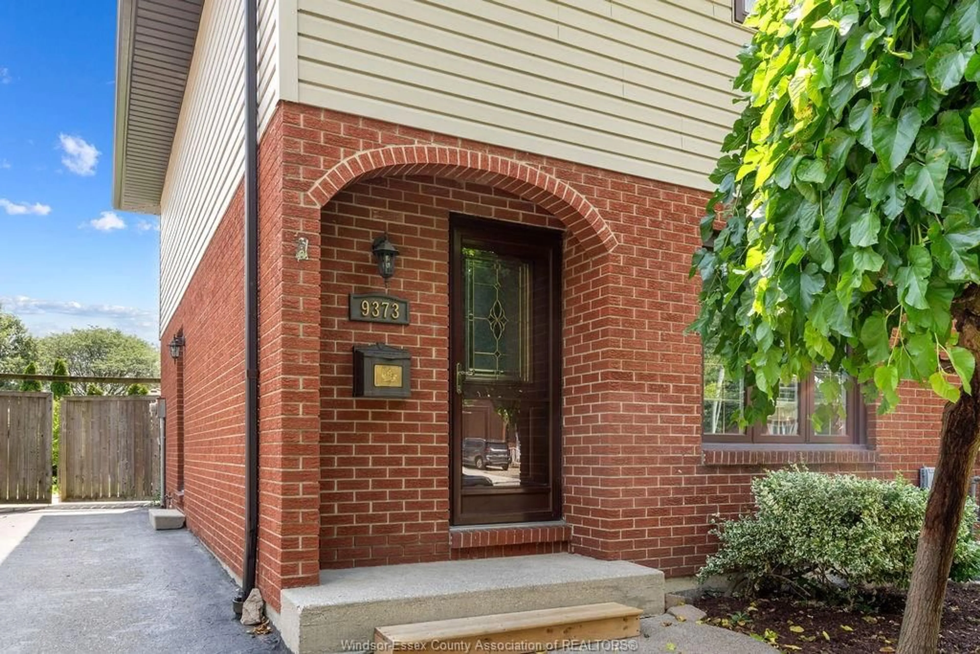 Home with brick exterior material, street for 9373 ALTEN Dr, Windsor Ontario N8R 1V9