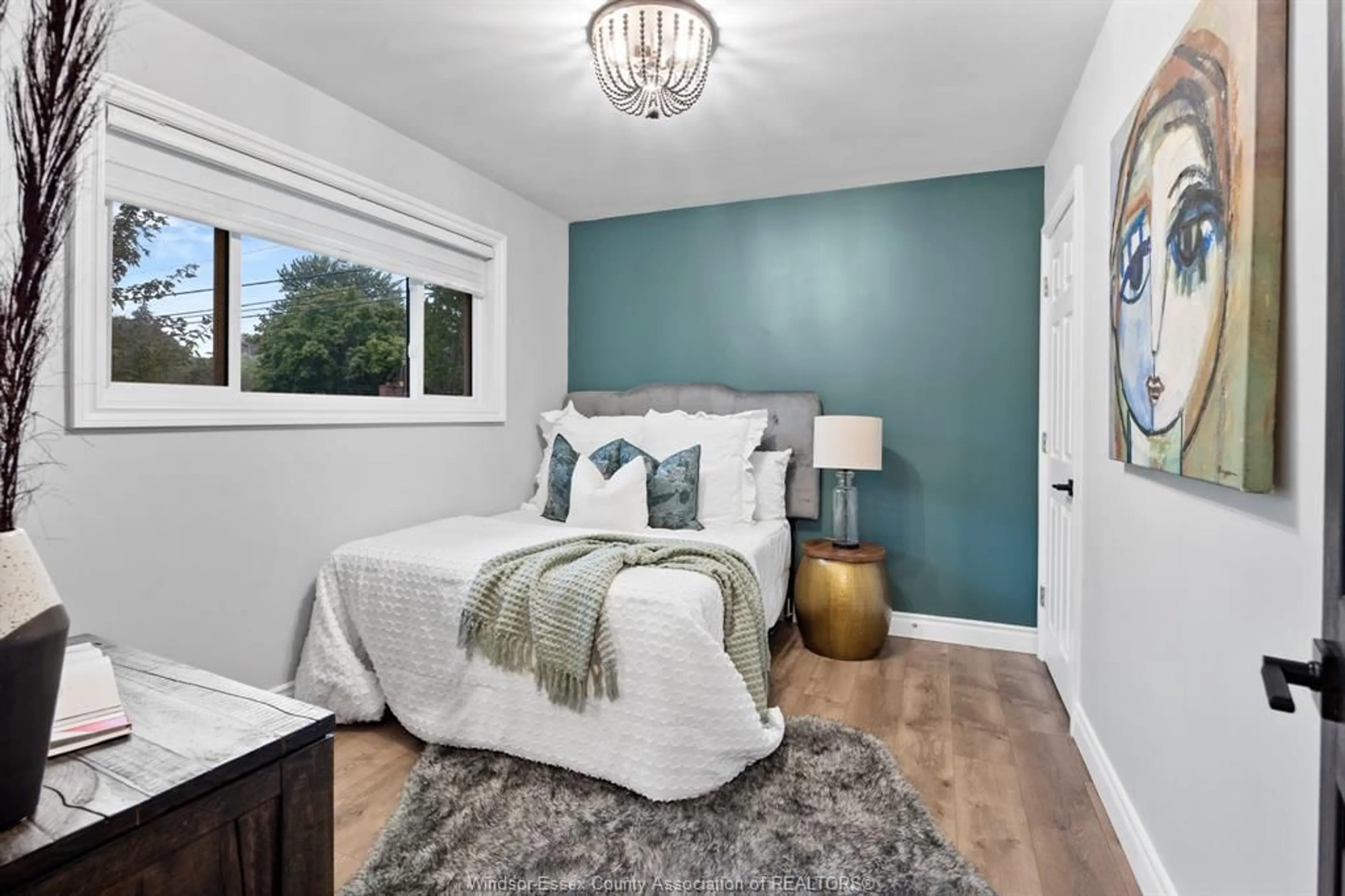 Bedroom with bed, wood/laminate floor for 3500 CHARLEVOIX, Windsor Ontario N9E 3B3