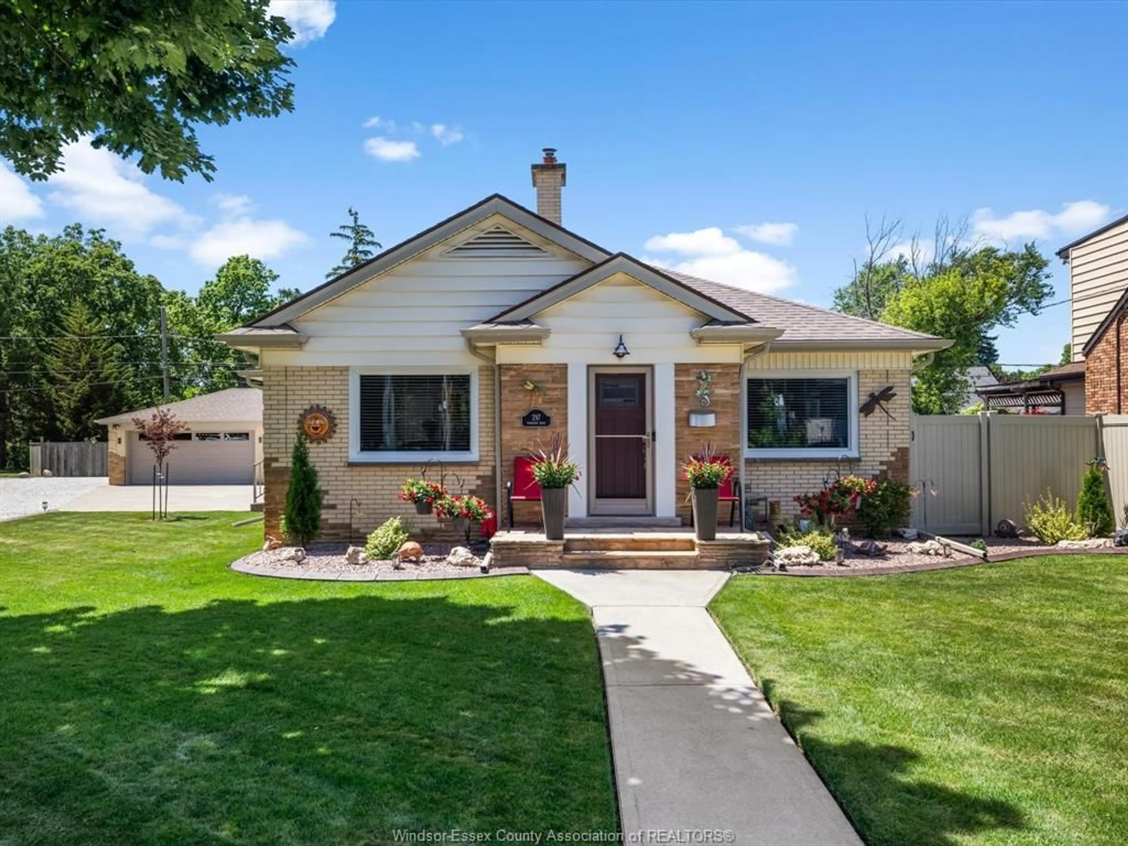 Home with vinyl exterior material, street for 297 FAIRVIEW Blvd, Windsor Ontario N8S 3C9