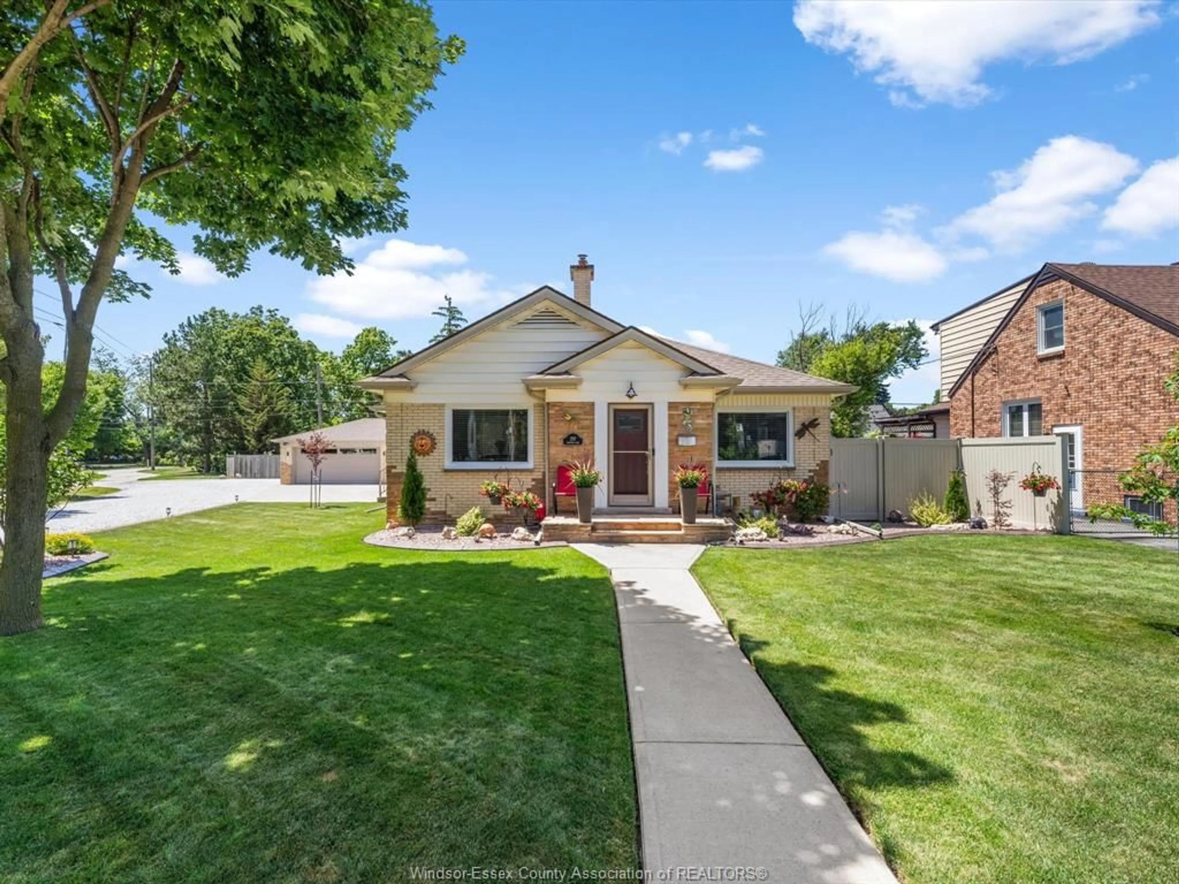 Home with brick exterior material, street for 297 FAIRVIEW Blvd, Windsor Ontario N8S 3C9