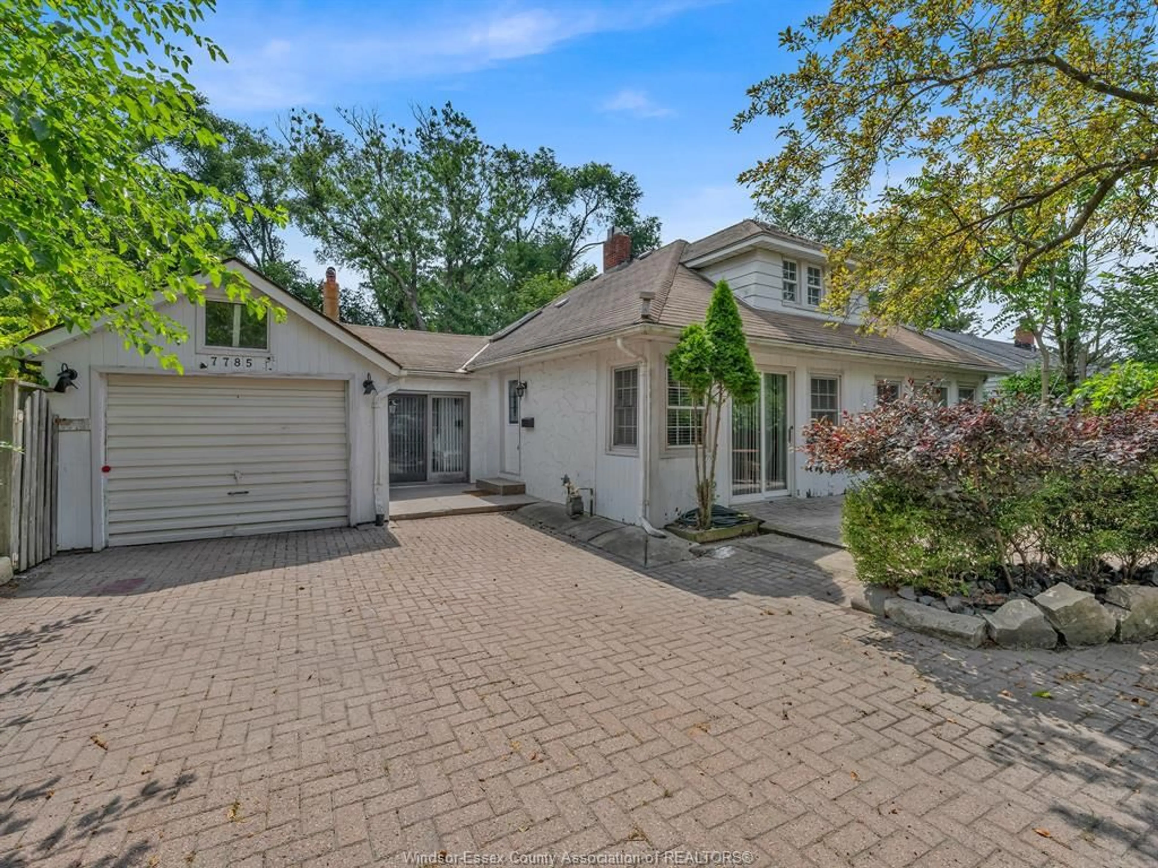 A pic from outside/outdoor area/front of a property/back of a property/a pic from drone, street for 7785 RIVERSIDE Dr, Windsor Ontario N8S 1E1