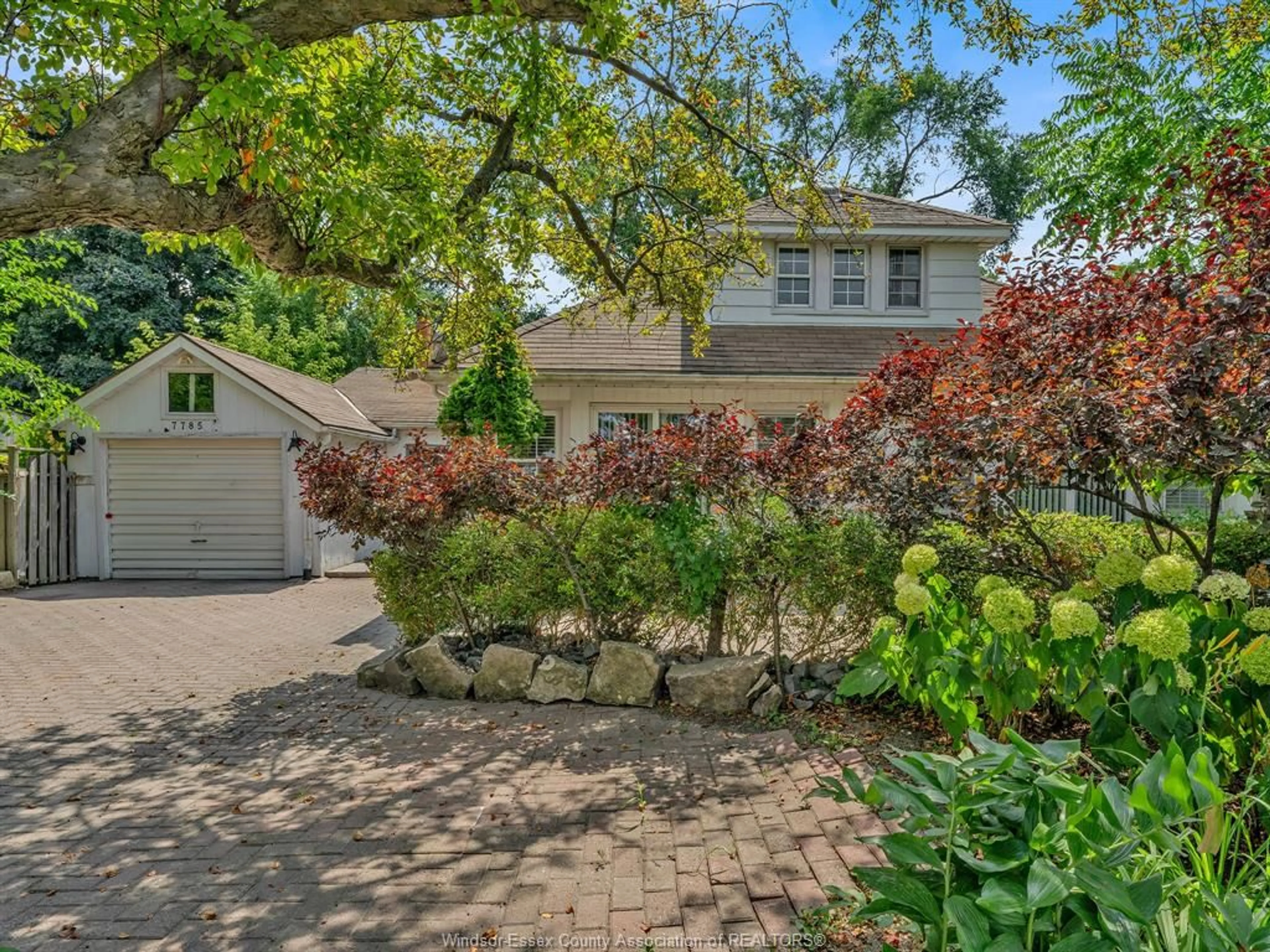 A pic from outside/outdoor area/front of a property/back of a property/a pic from drone, street for 7785 RIVERSIDE Dr, Windsor Ontario N8S 1E1