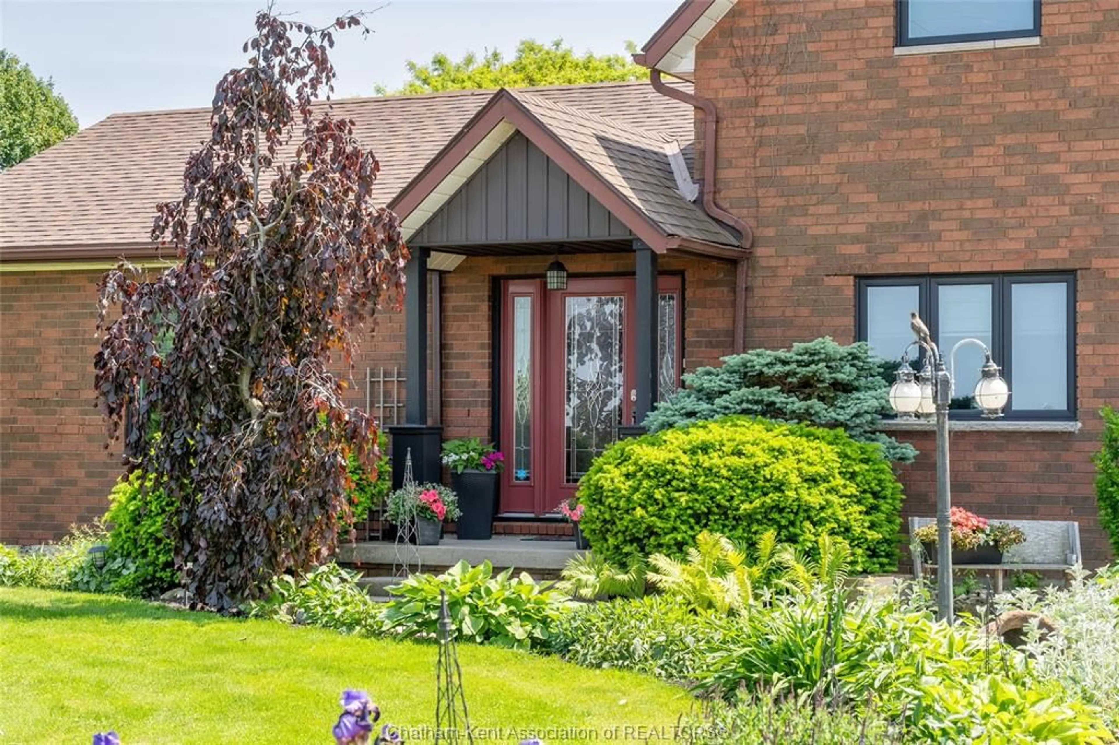 Home with brick exterior material, street for 7690 Grande River Line, Chatham-Kent Ontario N7M 5J7