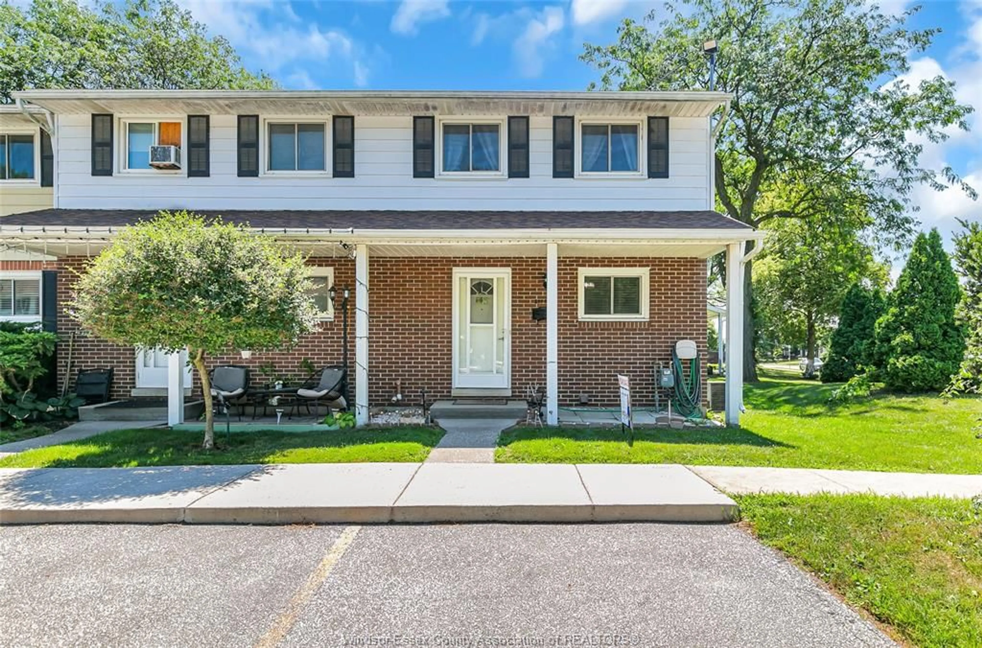 Home with brick exterior material, street for 2994 Meadowbrook Lane #2, Windsor Ontario N8T 3G8