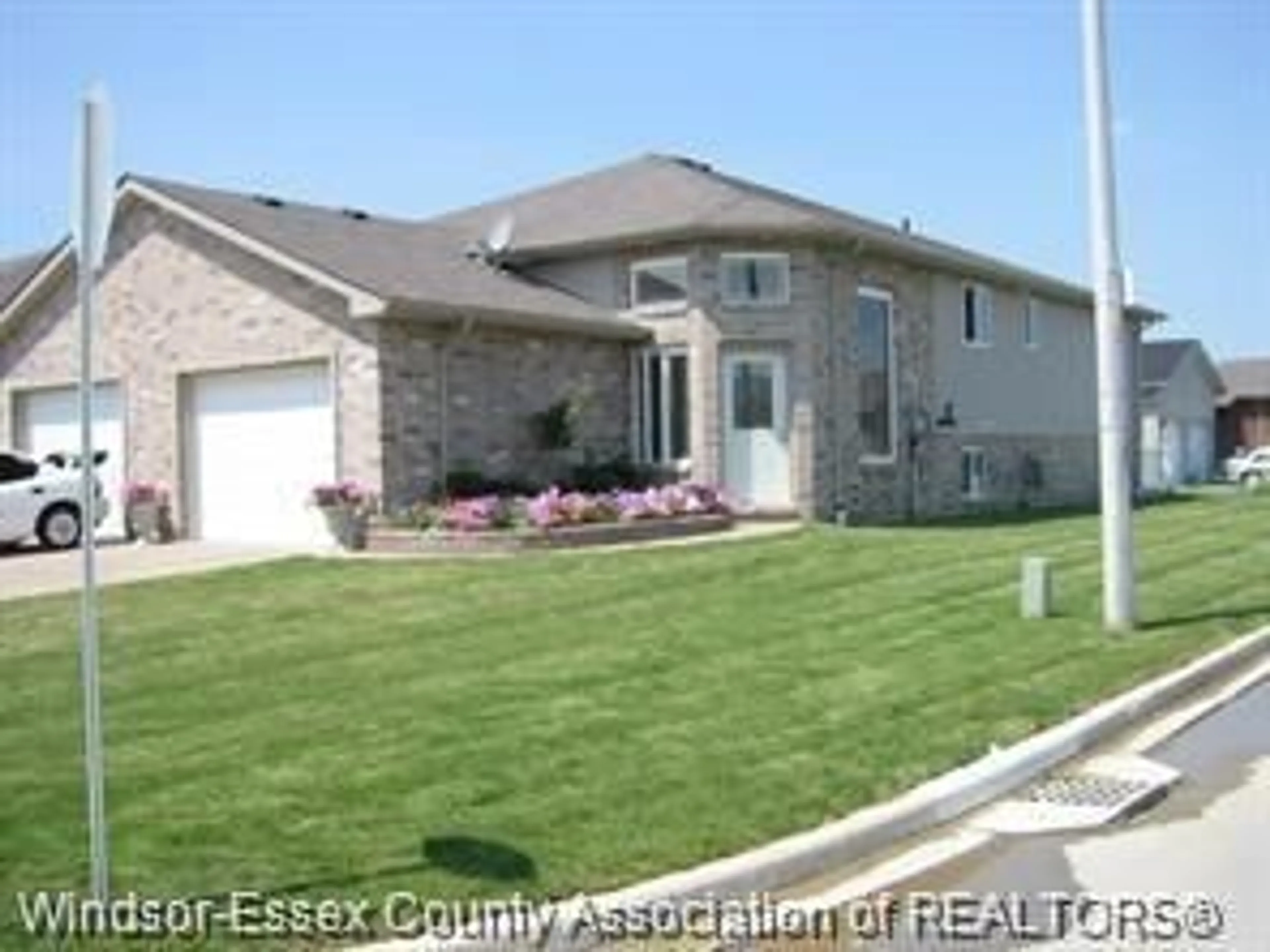 Home with brick exterior material, street for 1490 HIGHNOON, Windsor Ontario N9G 3B6