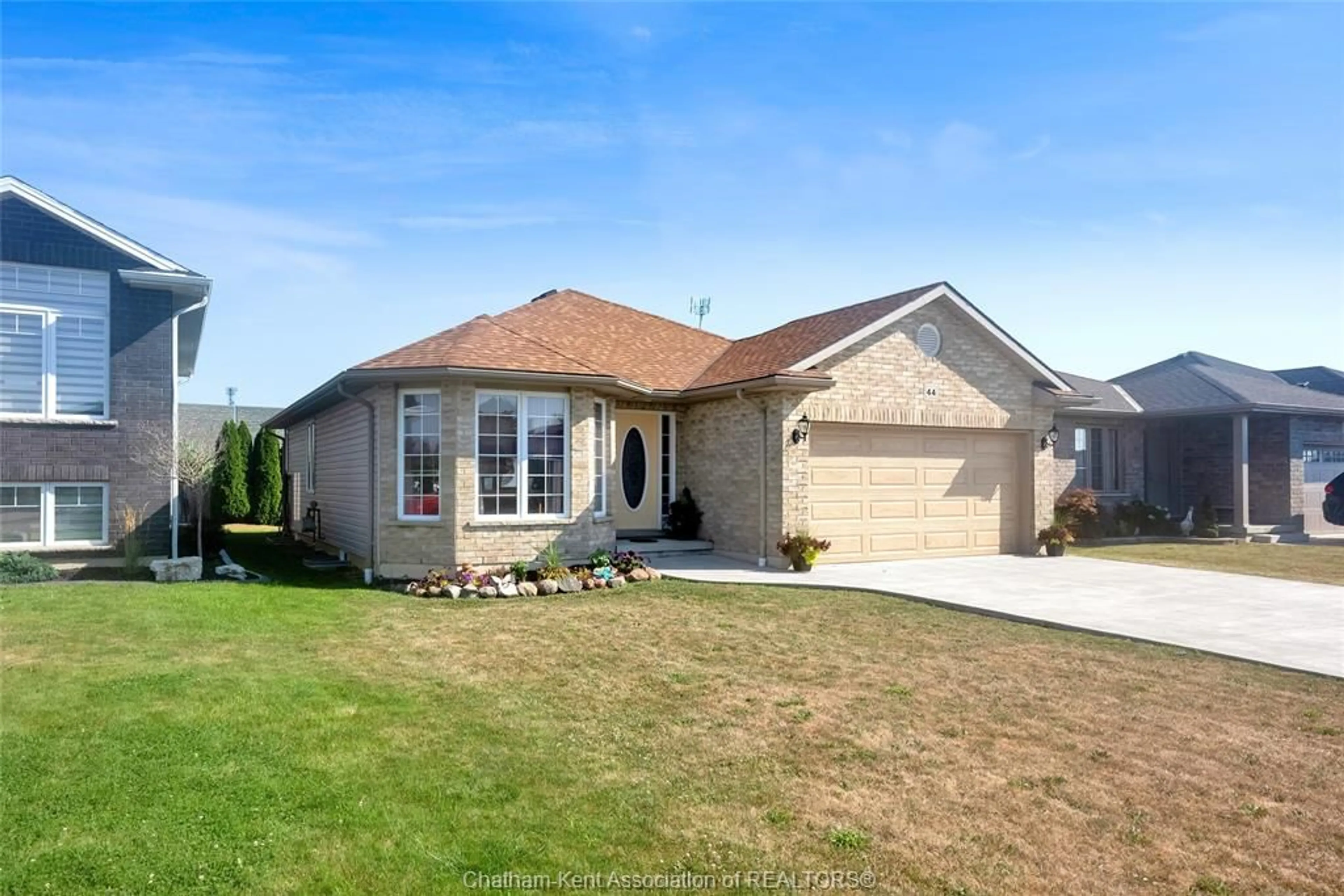 Home with vinyl exterior material, street for 44 Regal Dr, Tilbury Ontario N0P 2L0