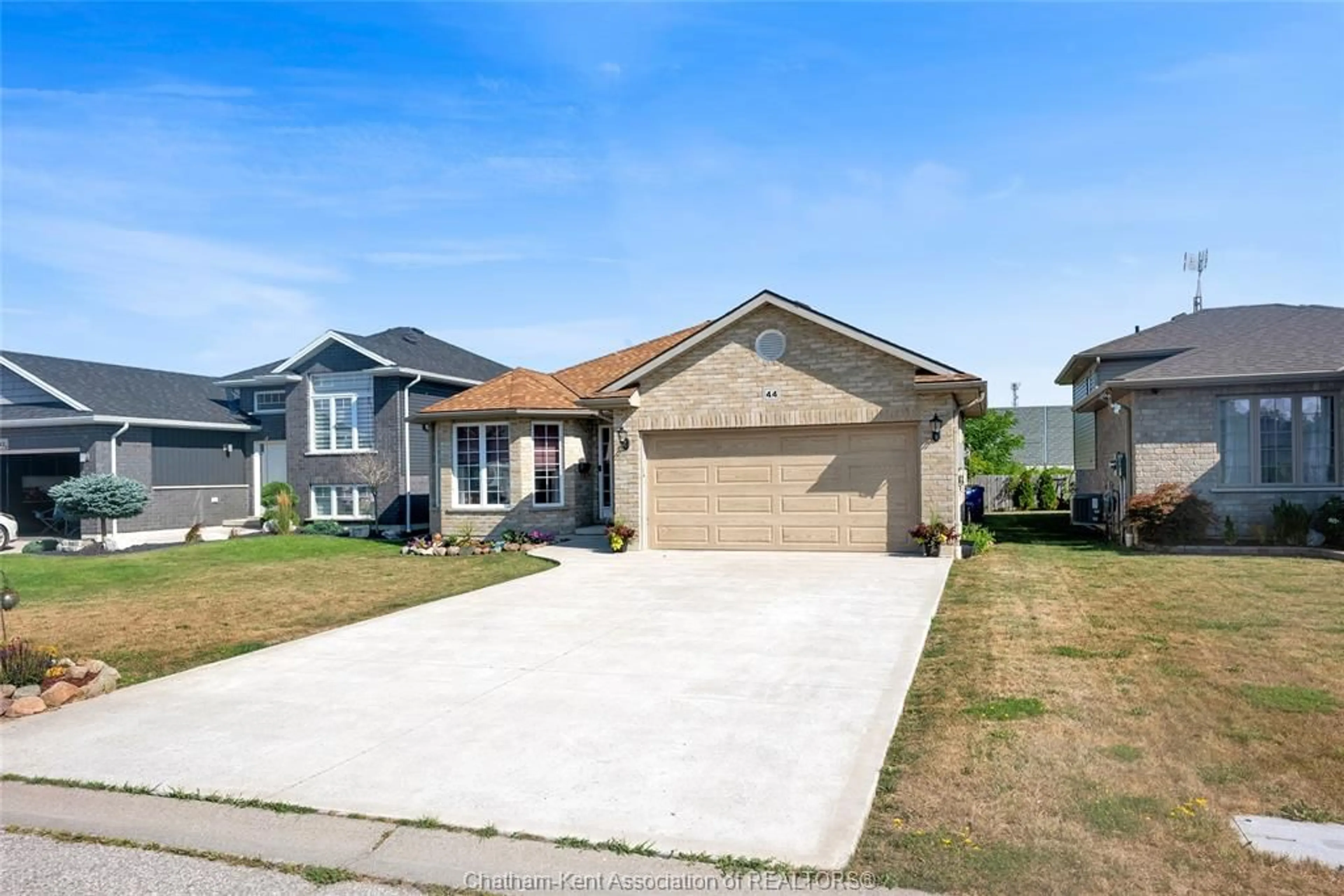 A pic from outside/outdoor area/front of a property/back of a property/a pic from drone, street for 44 Regal Dr, Tilbury Ontario N0P 2L0