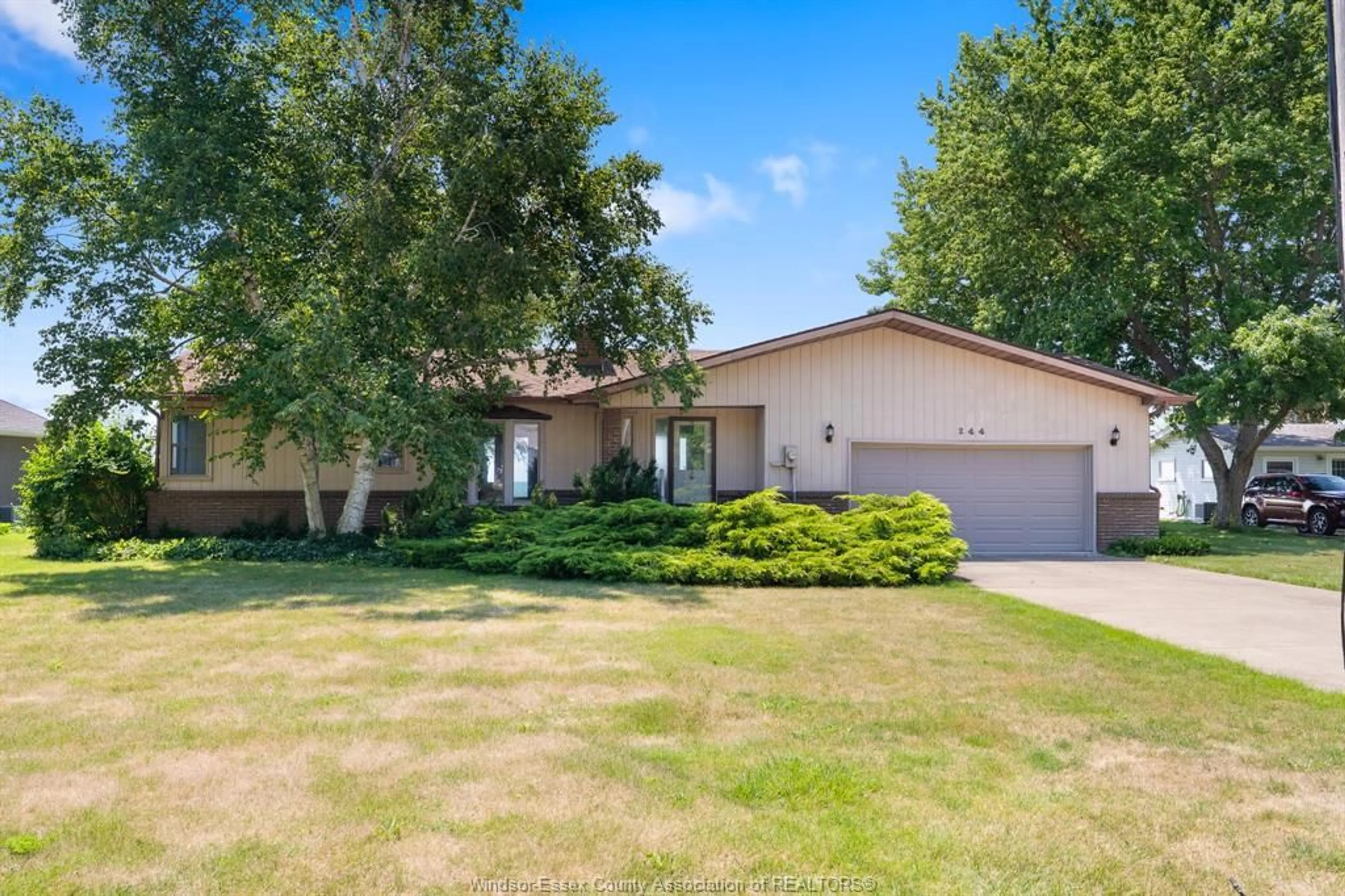 A pic from outside/outdoor area/front of a property/back of a property/a pic from drone, water/lake/river/ocean view for 244 Robson Rd, Leamington Ontario N8H 5R2