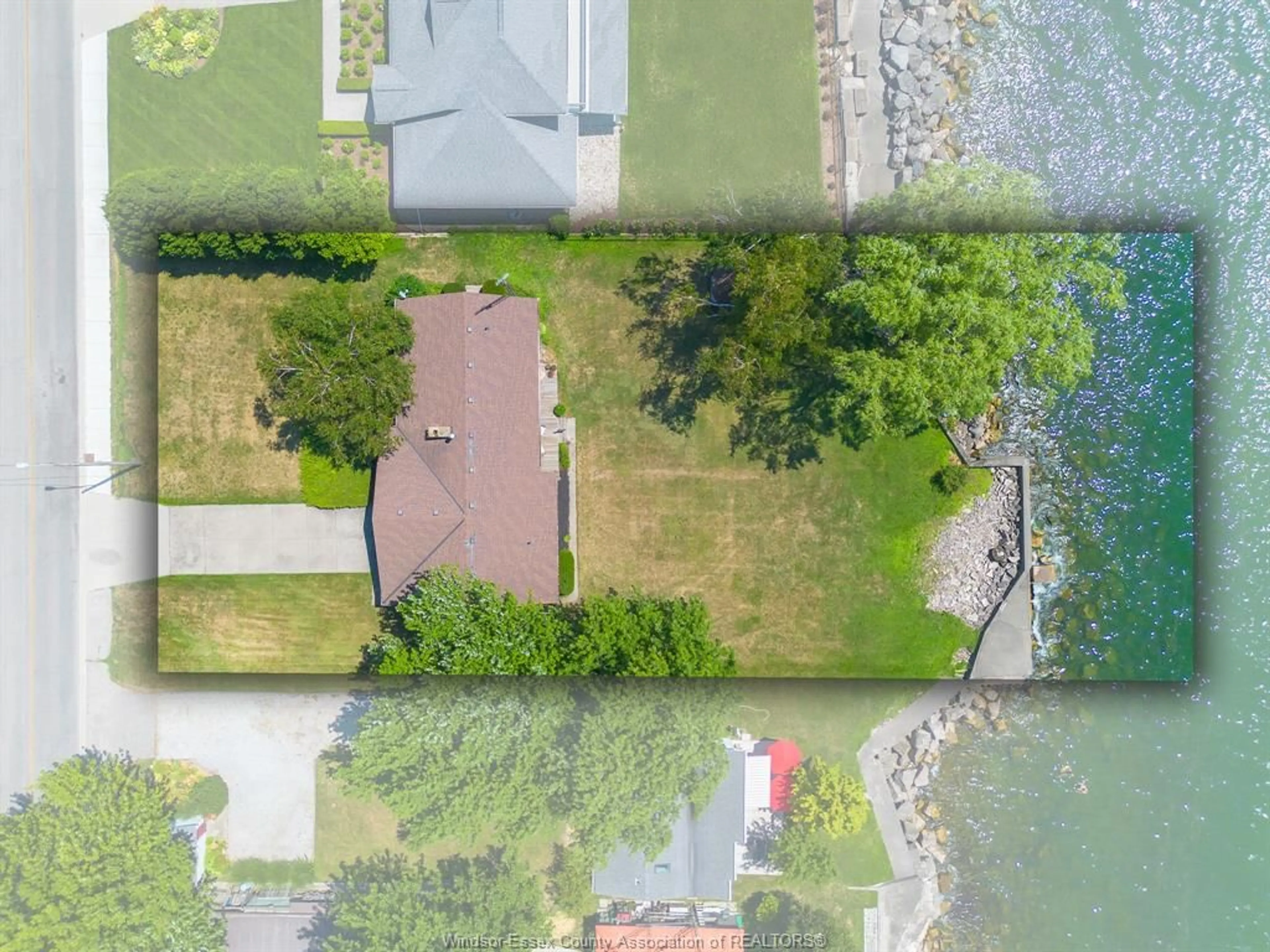 A pic from outside/outdoor area/front of a property/back of a property/a pic from drone, water/lake/river/ocean view for 244 Robson Rd, Leamington Ontario N8H 5R2