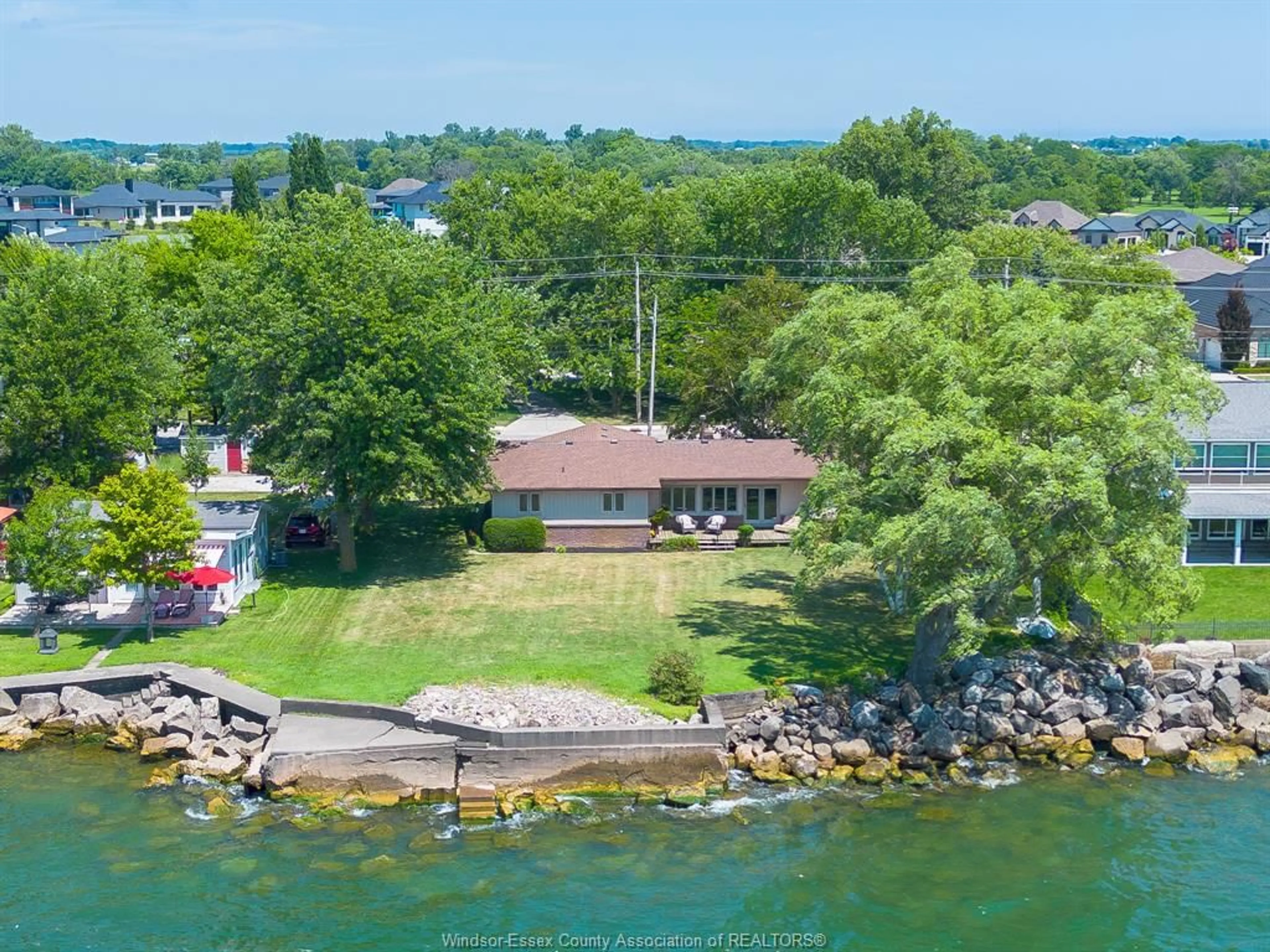A pic from outside/outdoor area/front of a property/back of a property/a pic from drone, water/lake/river/ocean view for 244 Robson Rd, Leamington Ontario N8H 5R2