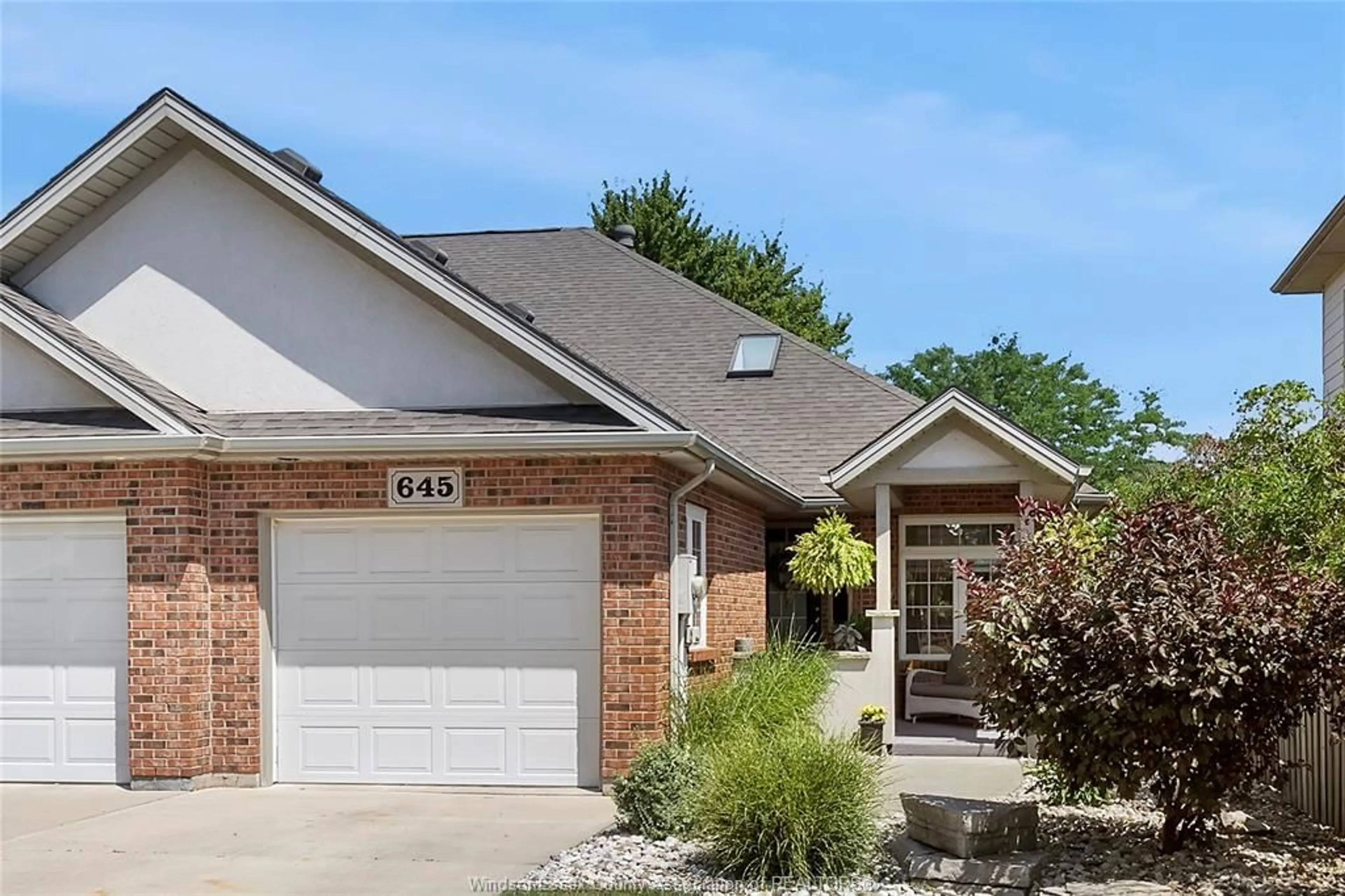 Home with brick exterior material, street for 645 ST. CHARLES, Lakeshore Ontario N0R 1A0
