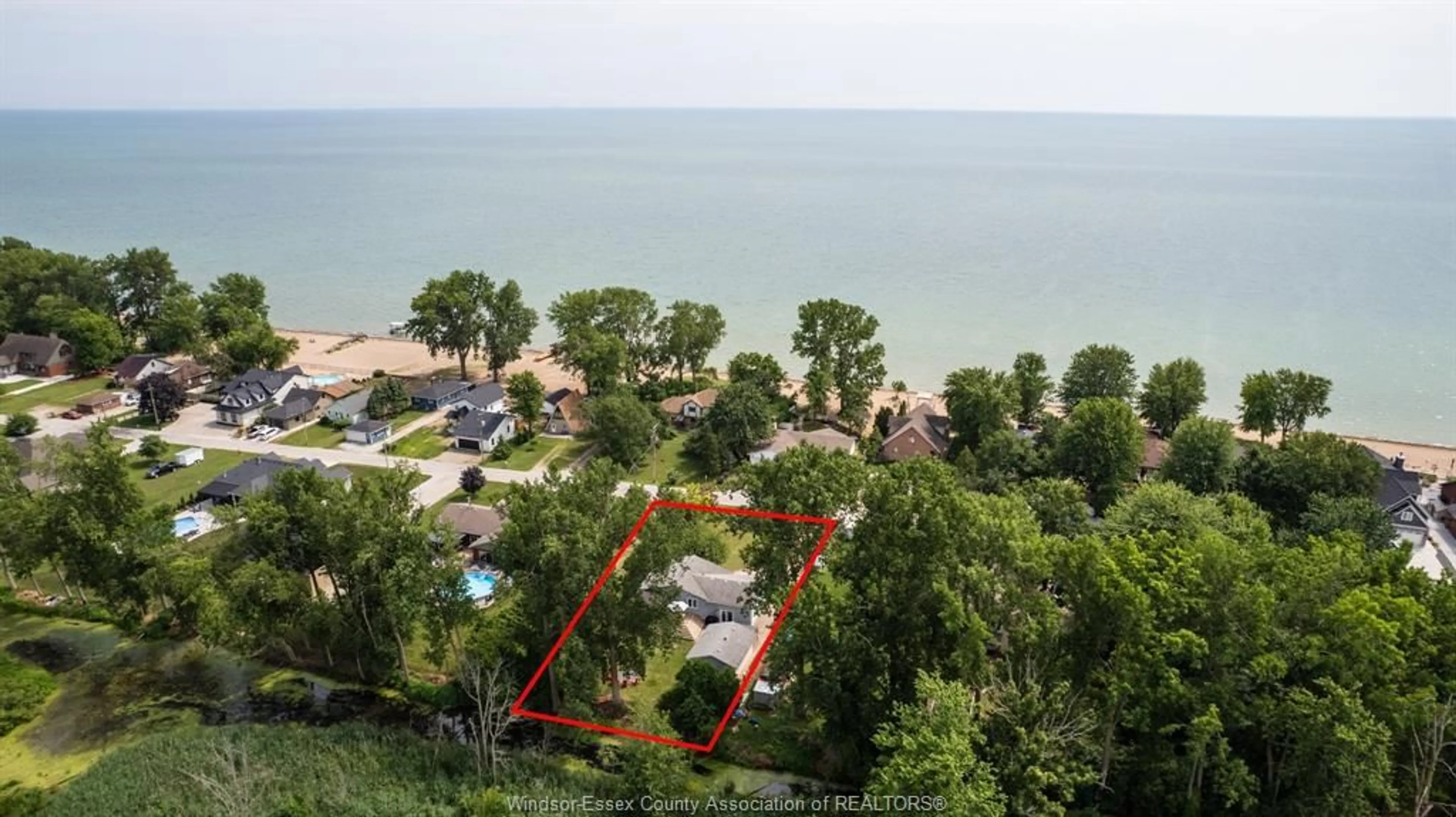A pic from outside/outdoor area/front of a property/back of a property/a pic from drone, water/lake/river/ocean view for 472 LAKEWOOD Dr, Amherstburg Ontario N9V 2Y8
