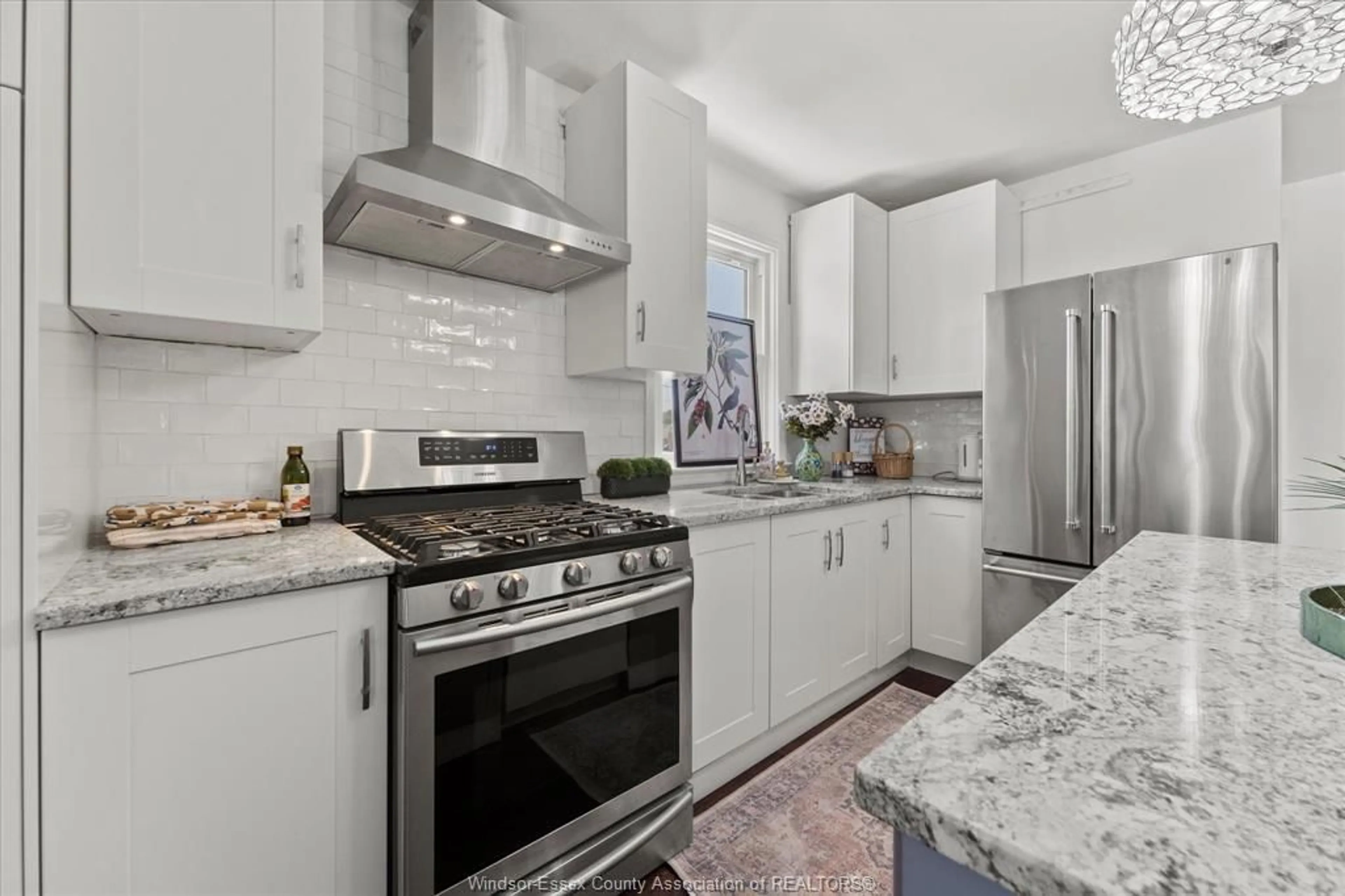 Open concept kitchen, ceramic/tile floor for 379 LAUZON Rd, Windsor Ontario N8S 3M1